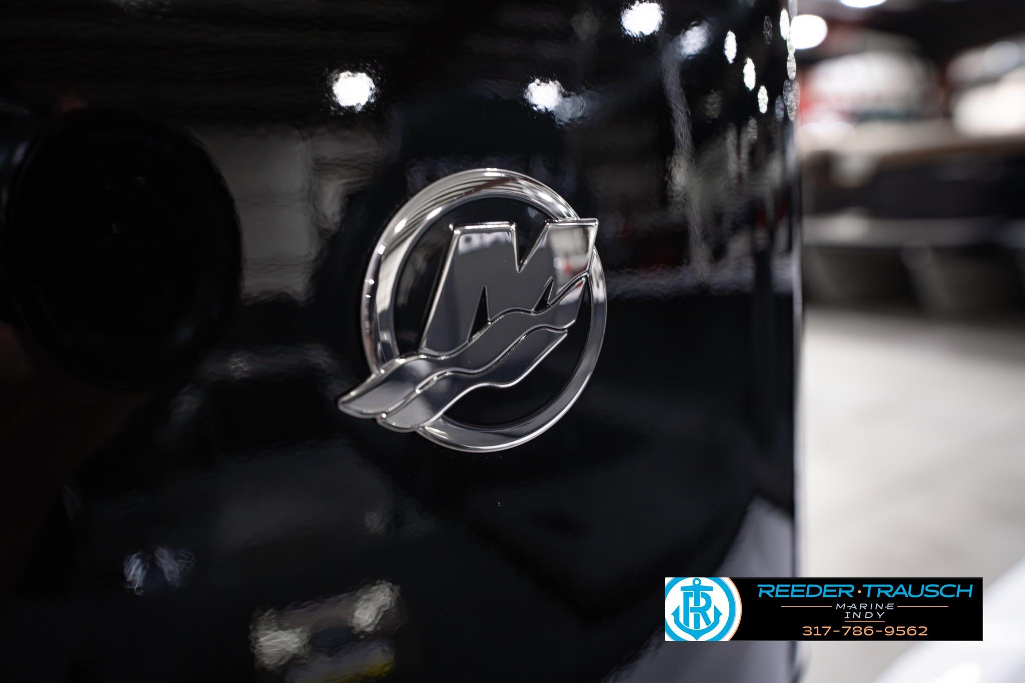 Close-up of 2026 Lund 1650 Rebel XL SS logo on a glossy surface.
