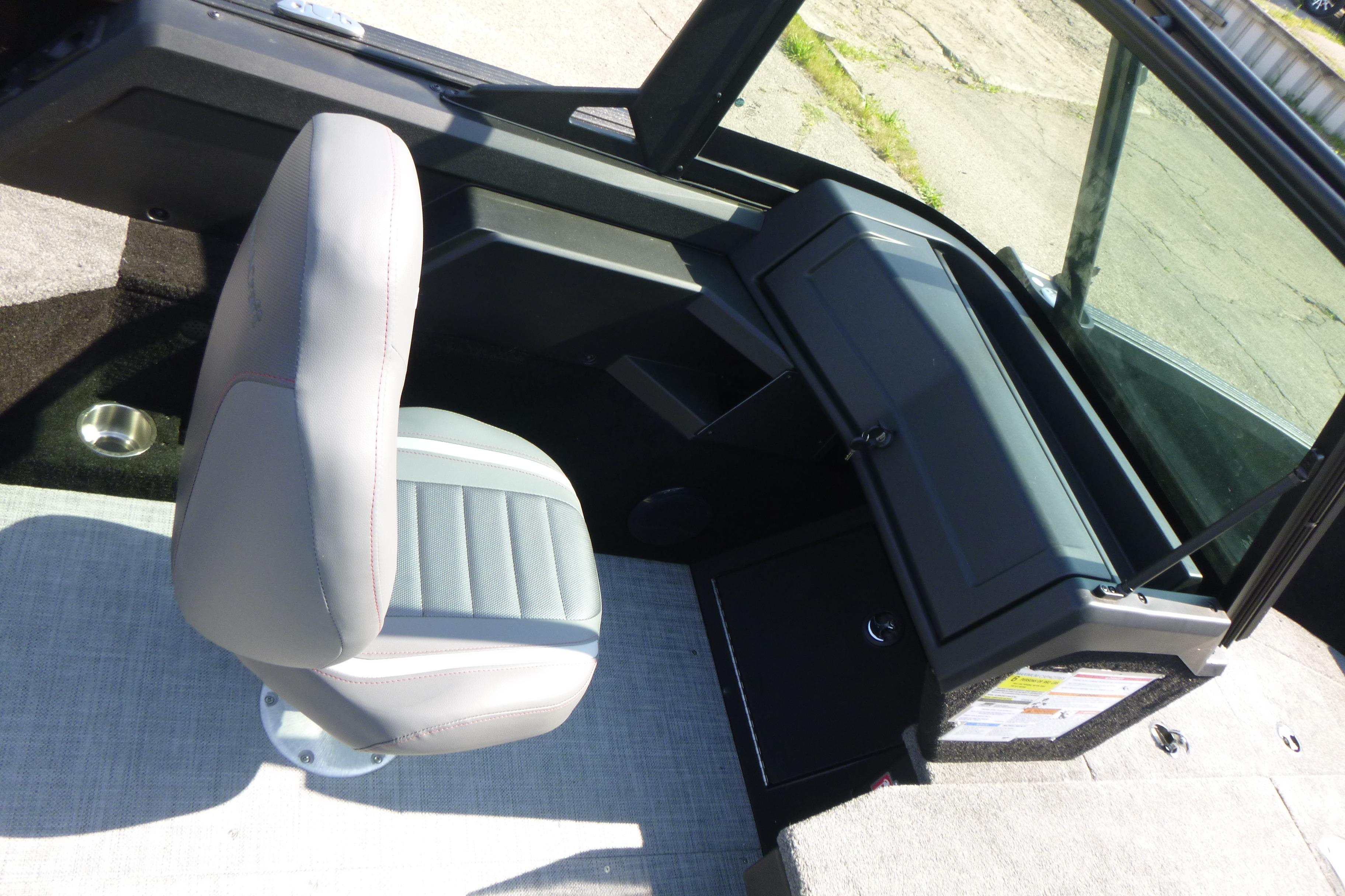 2024 Alumacraft Competitor 185X Sport interior with gray seating and dashboard.