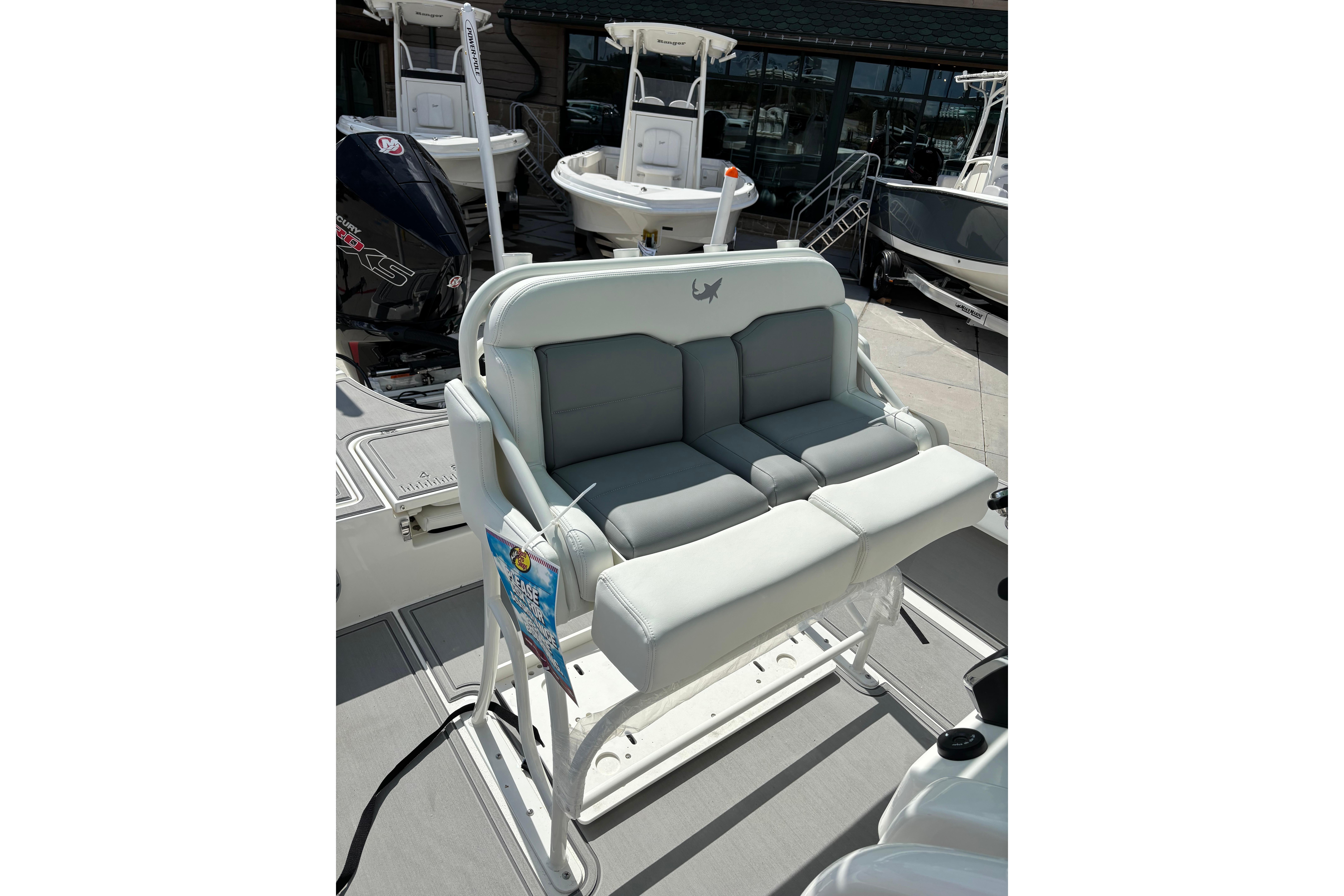 2026 Mako 24 APEX boat seating with dual cushioned seats and sleek design.