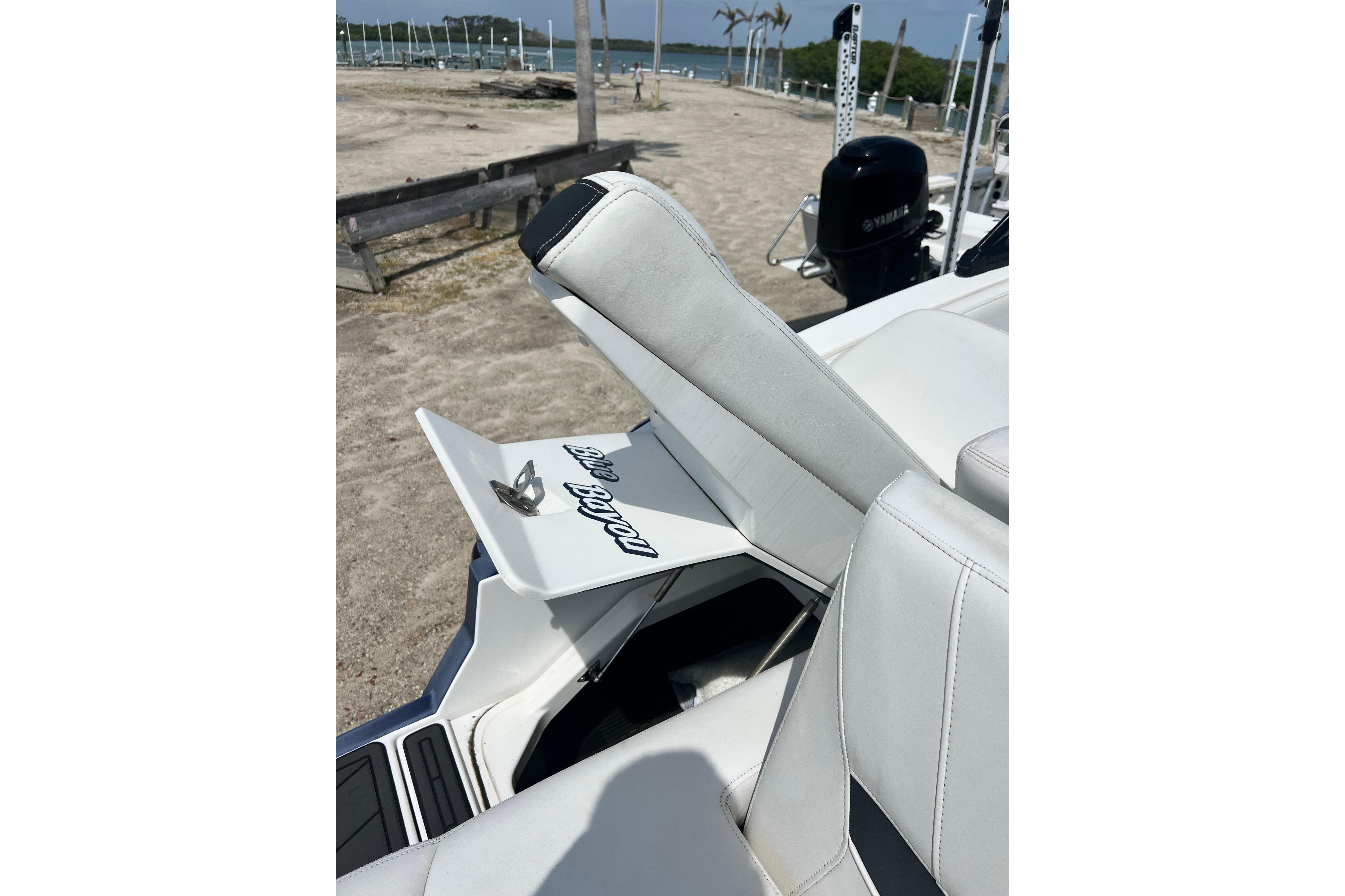 2015 Monterey 268SS Super Sport boat interior with white seating and storage compartment.