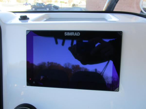 Simrad display on 2025 Sea Pro 230 Bay boat dashboard.