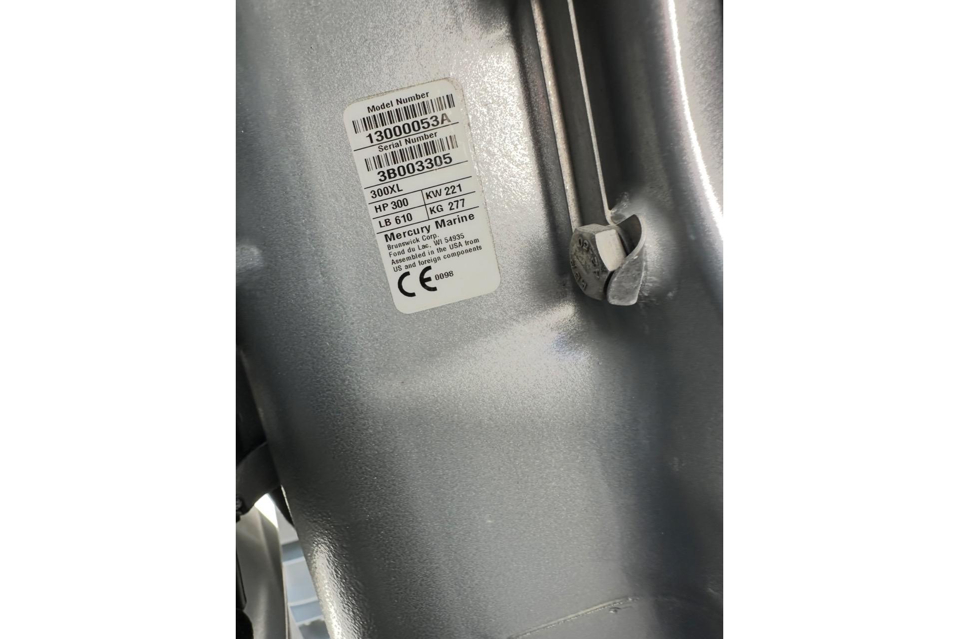 Label on a 2021 Custom Infusion 34 CC boat engine, showing model and serial numbers.
