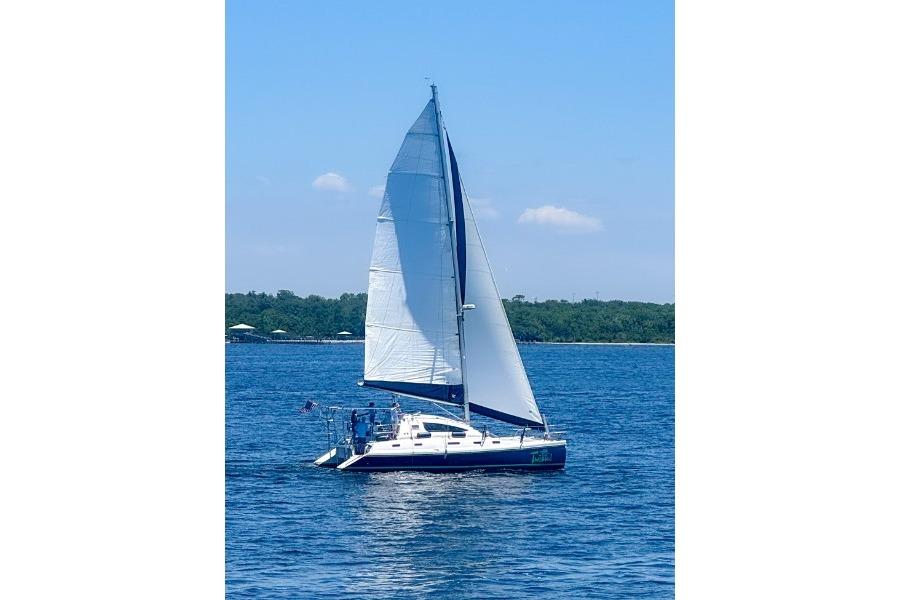 Sailing yacht Island Spirit 37, 1999 model, cruising on a sunny day.