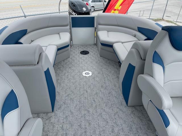 2025 Berkshire 22 RFX LE Tri-toon Pontoon interior with plush seating and modern design.
