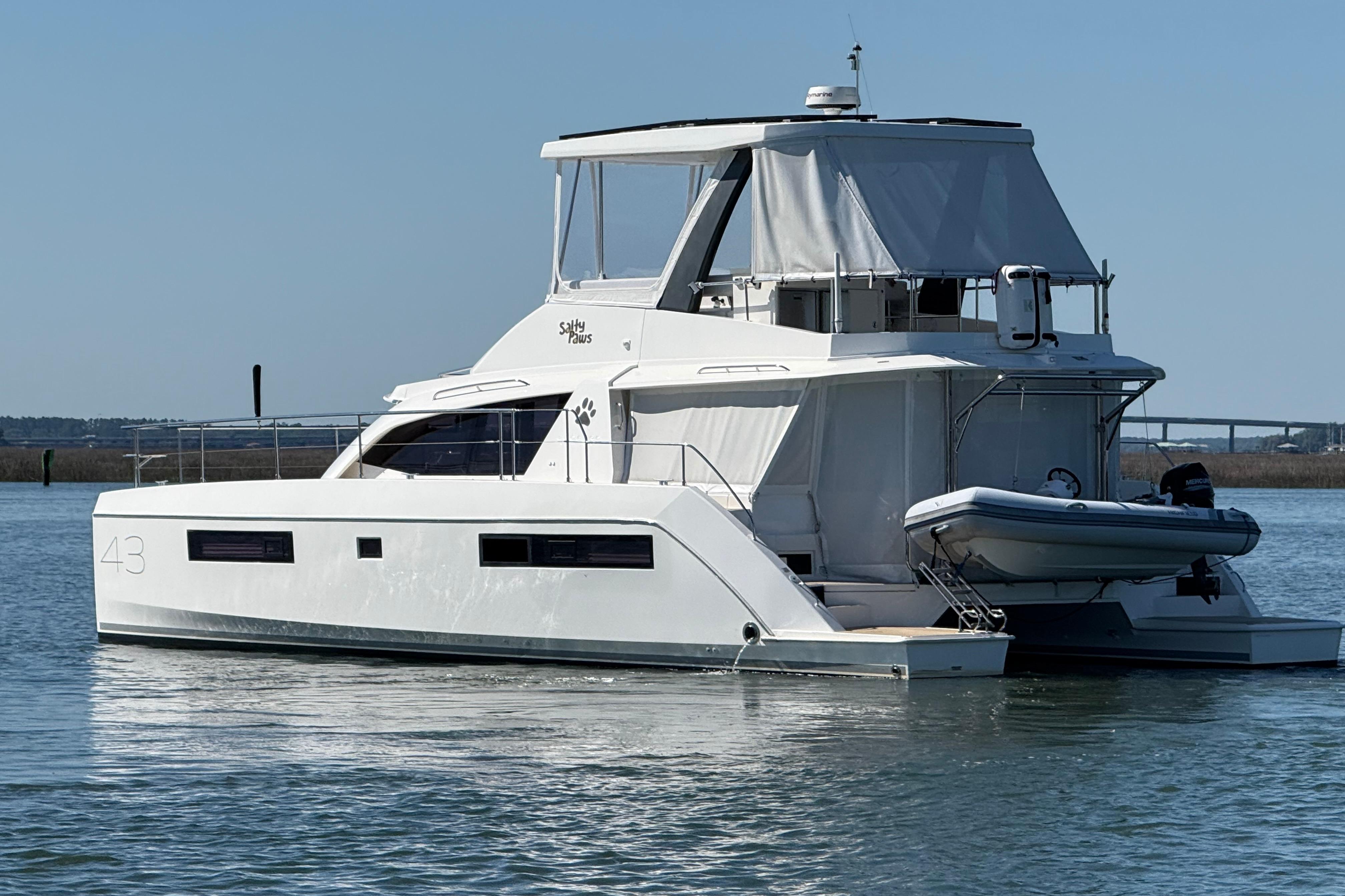 2021 Leopard 43 Powercat yacht on calm water, featuring sleek design and modern amenities.