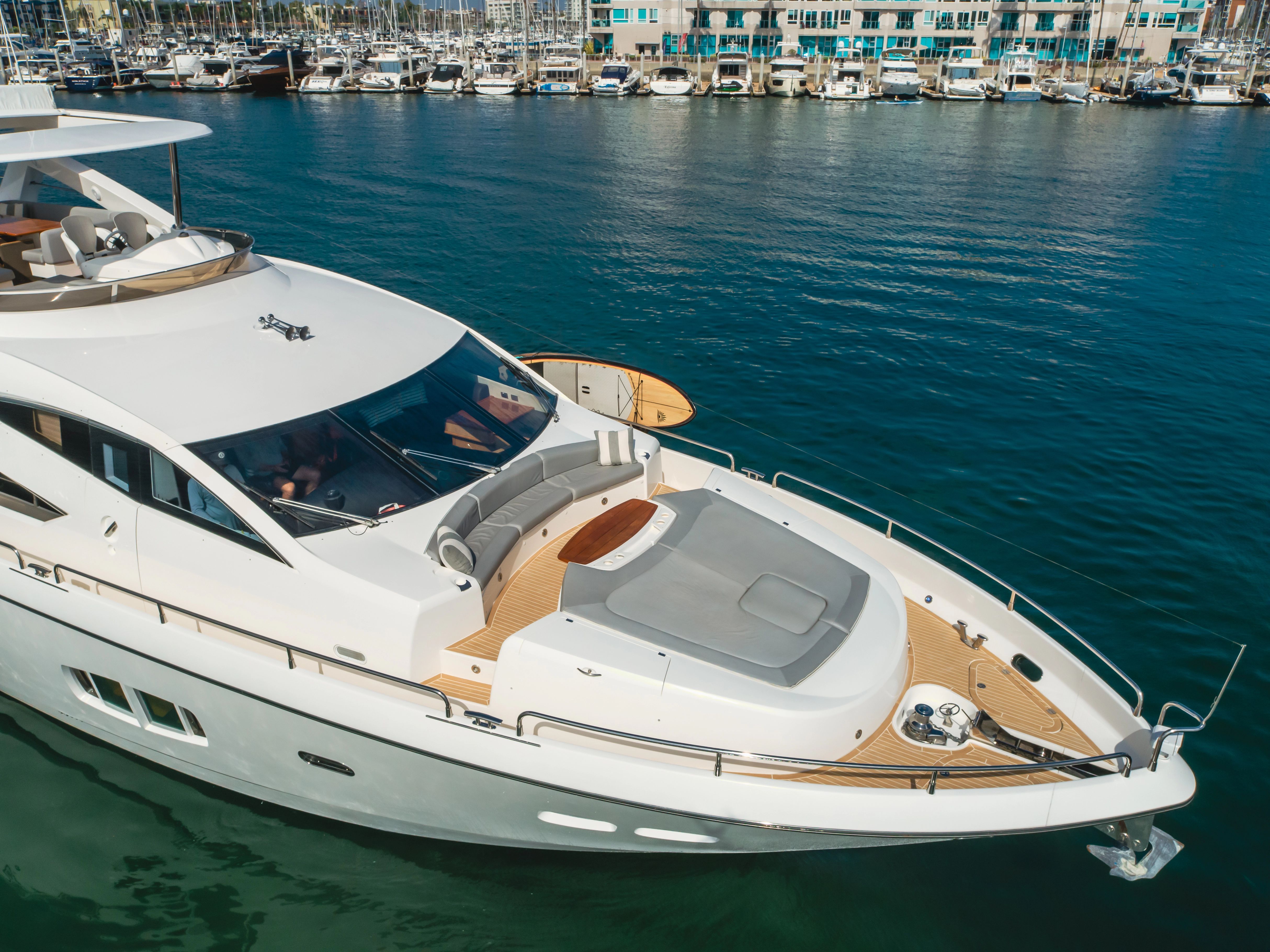 2011 Sunseeker 88 Yacht docked in marina.