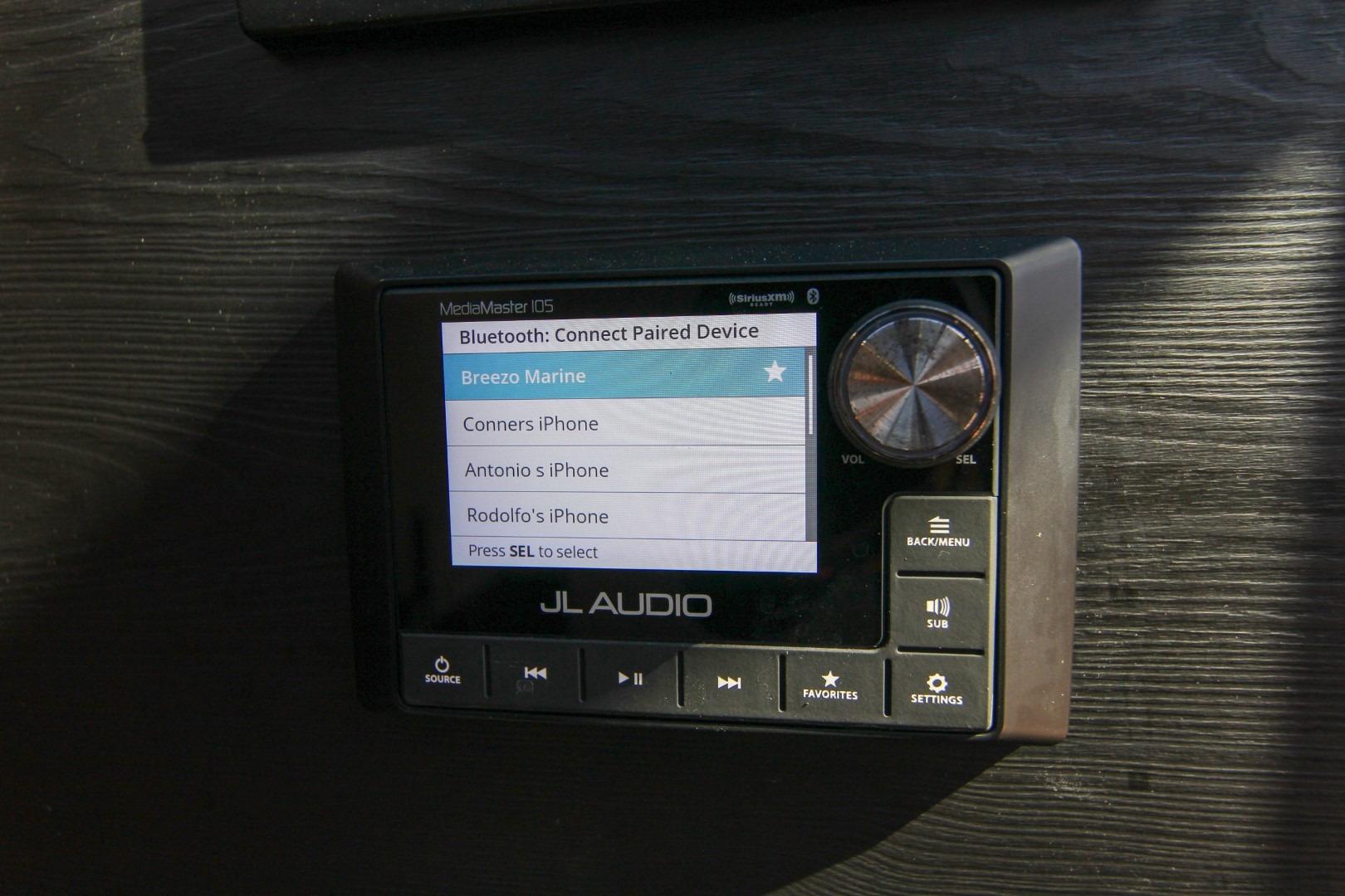 JL Audio MediaMaster 105 on Vanquish Yachts VQ45, displaying Bluetooth device connections.