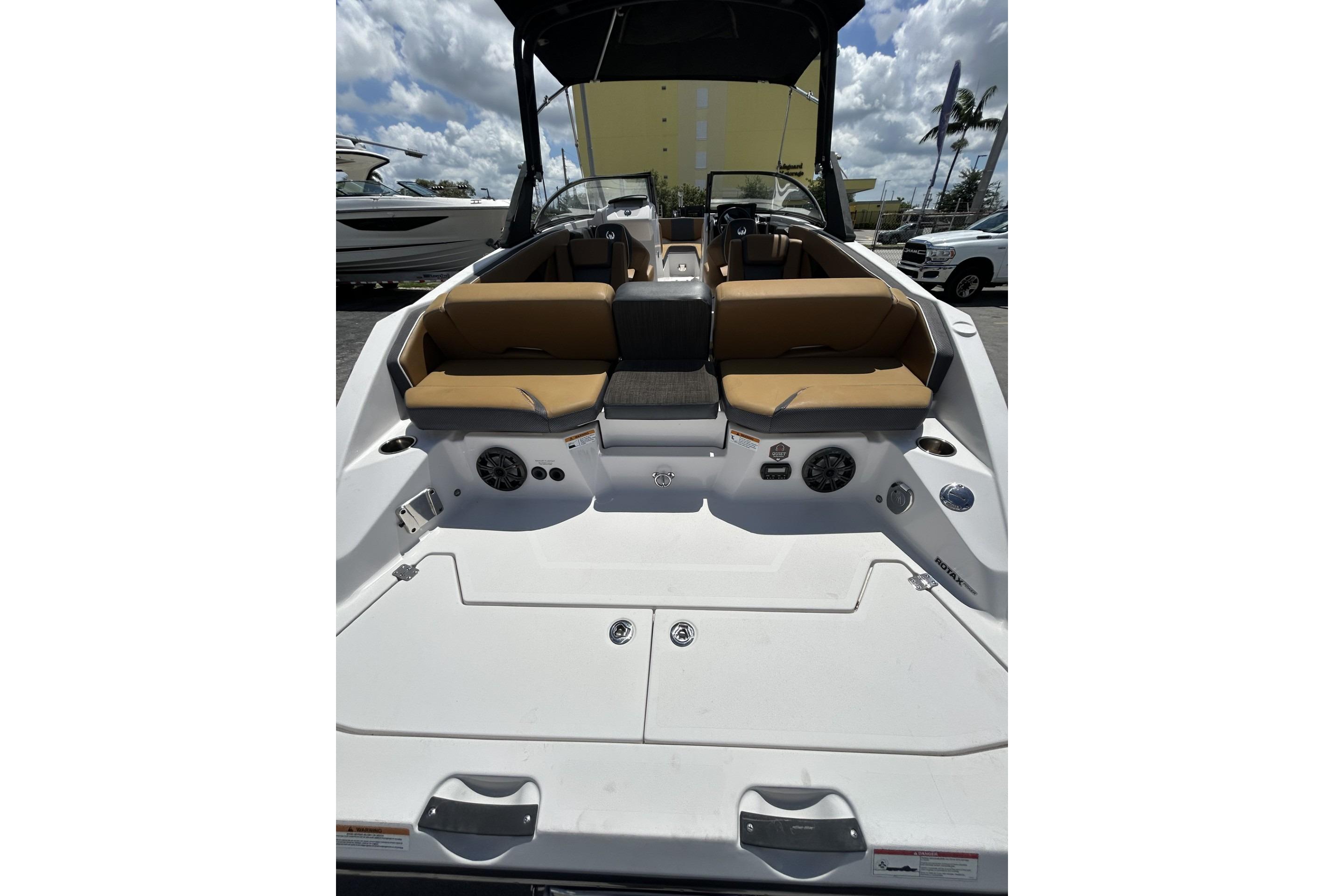 2019 Scarab 255 ID boat interior with tan seating and modern design.