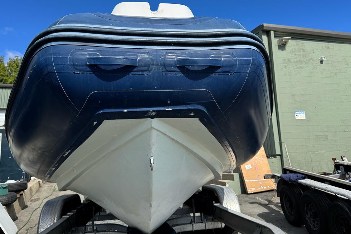 2020 AB Inflatables Oceanus 21 VST boat on trailer, front view.