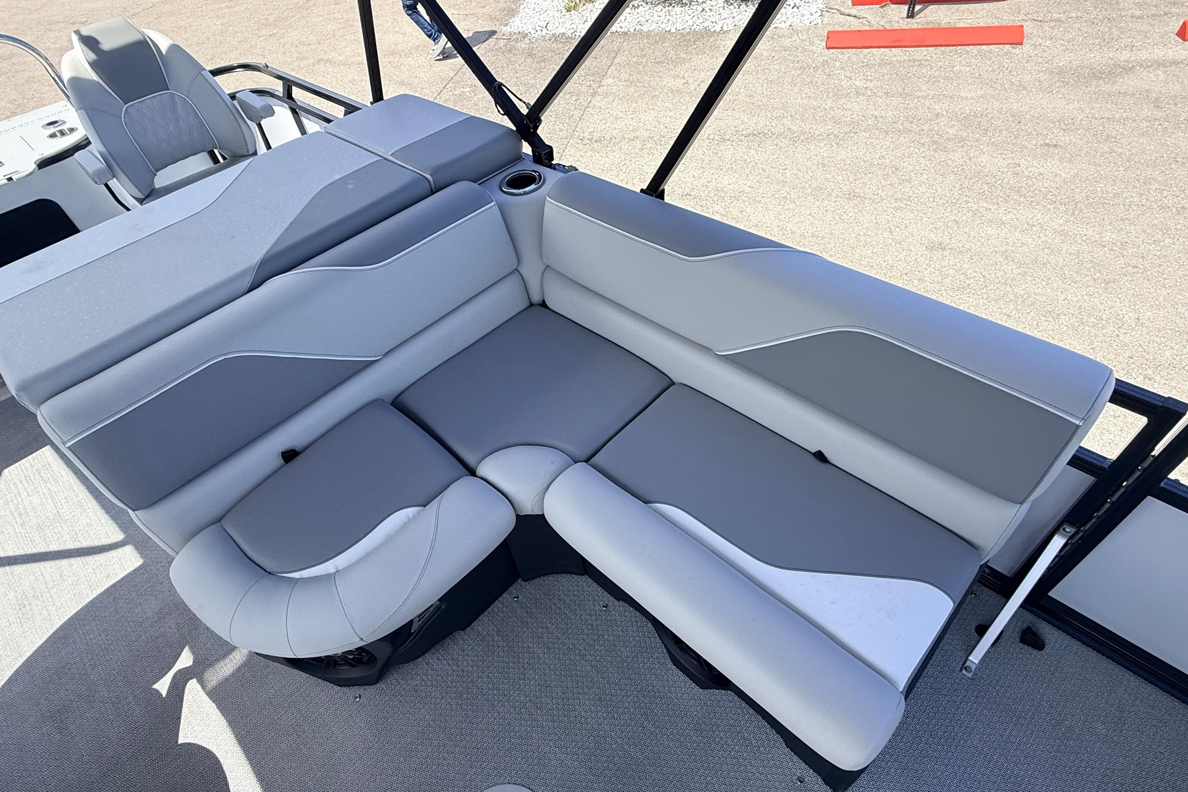 2026 Avalon 2385 Venture 85 Tri Toon boat with sleek gray seating and modern design.