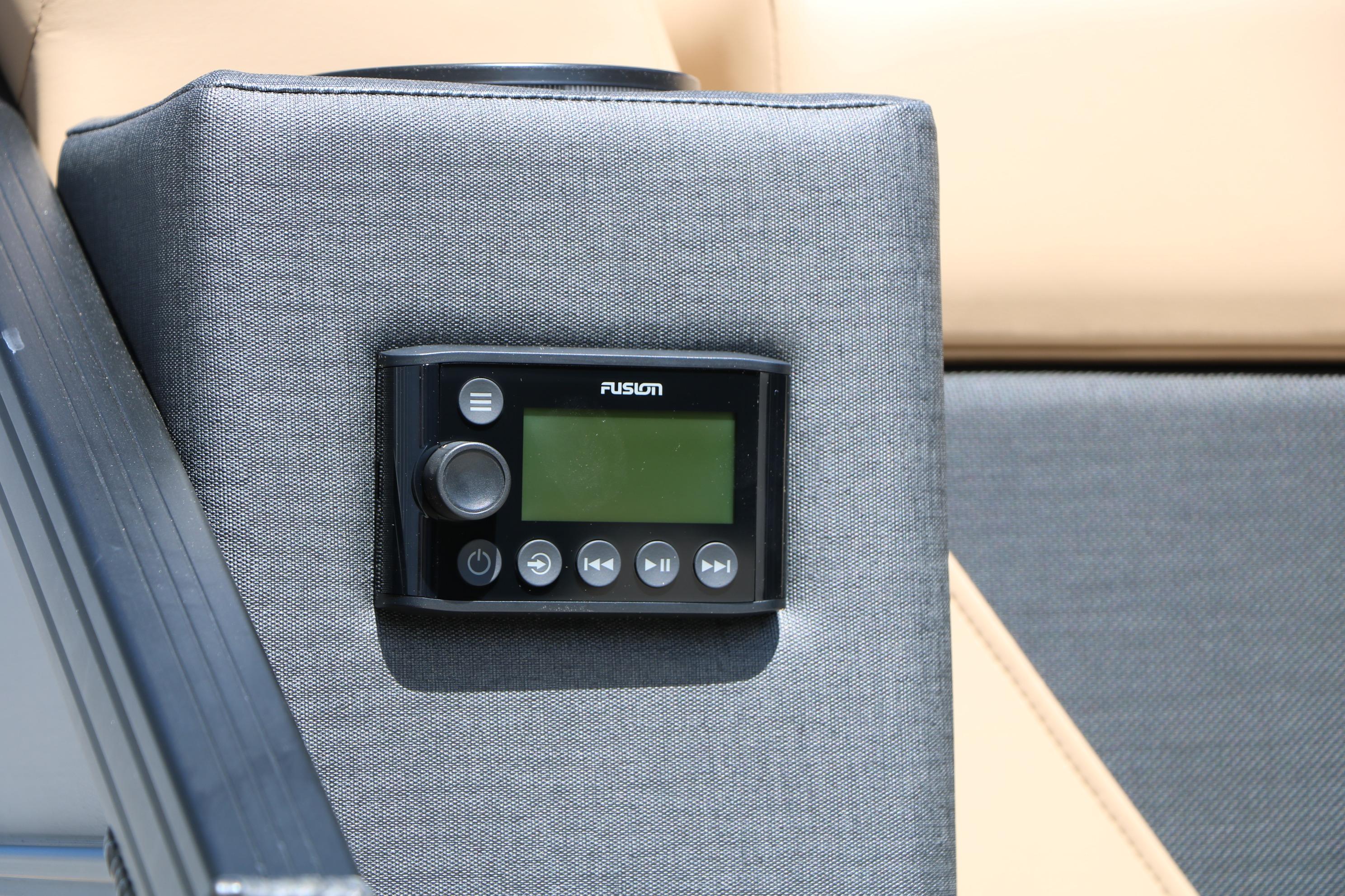Audio control panel on 2026 Evotti 725 CS Tri-Toon boat, featuring sleek design and modern interface.