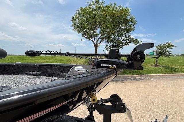 2026 Ranger VS1782SC Angler boat with Minn Kota trolling motor in a scenic outdoor setting.