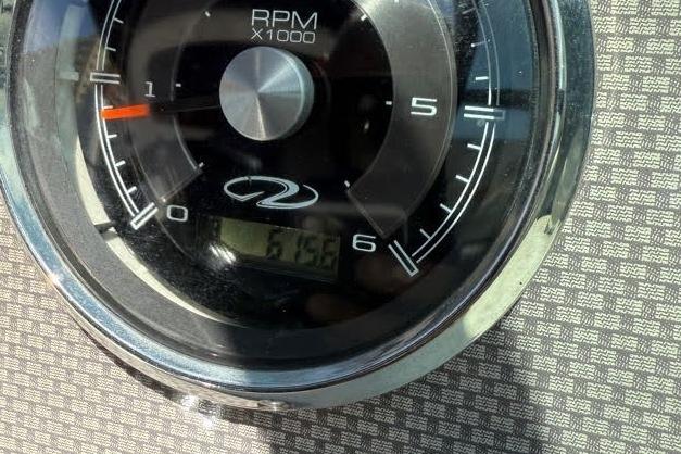 Close-up of a 2014 Regal 2500 Bowrider RPM gauge displaying 615.