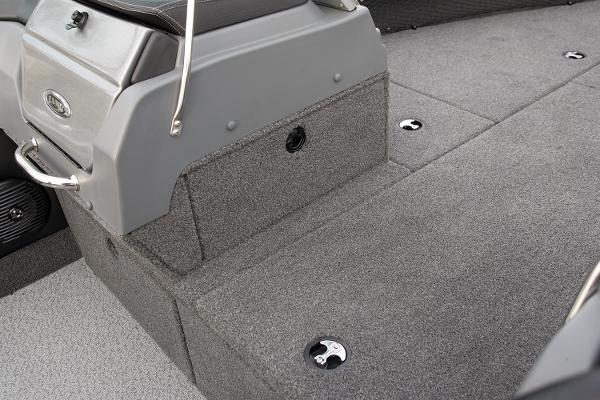 Manufacturer Provided Image: 2019 Lund 2175 Pro-V boat interior with gray carpeted flooring and storage compartments.
