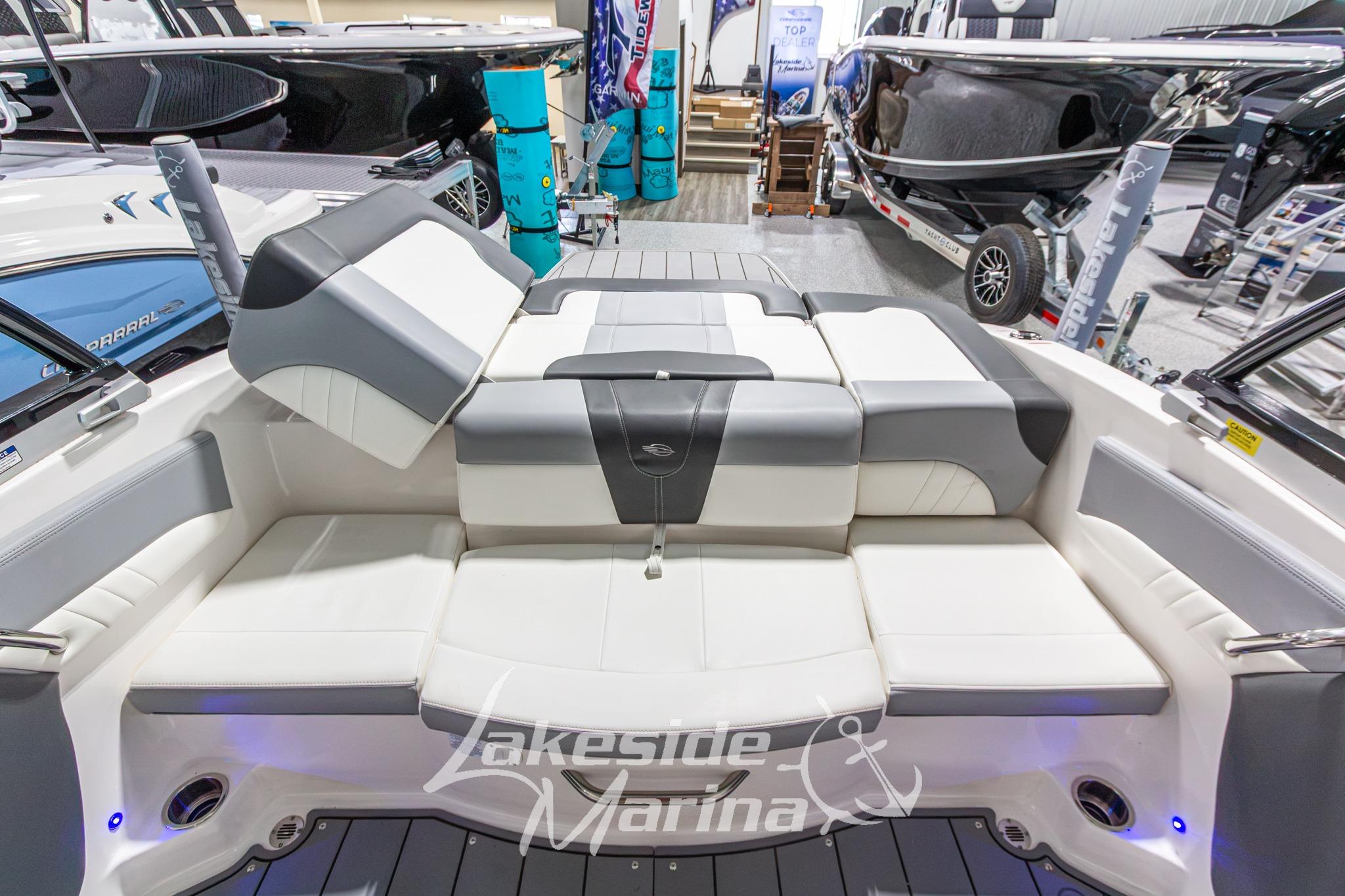 2022 Chaparral 21 SSi boat interior with spacious seating at Lakeside Marina showroom.