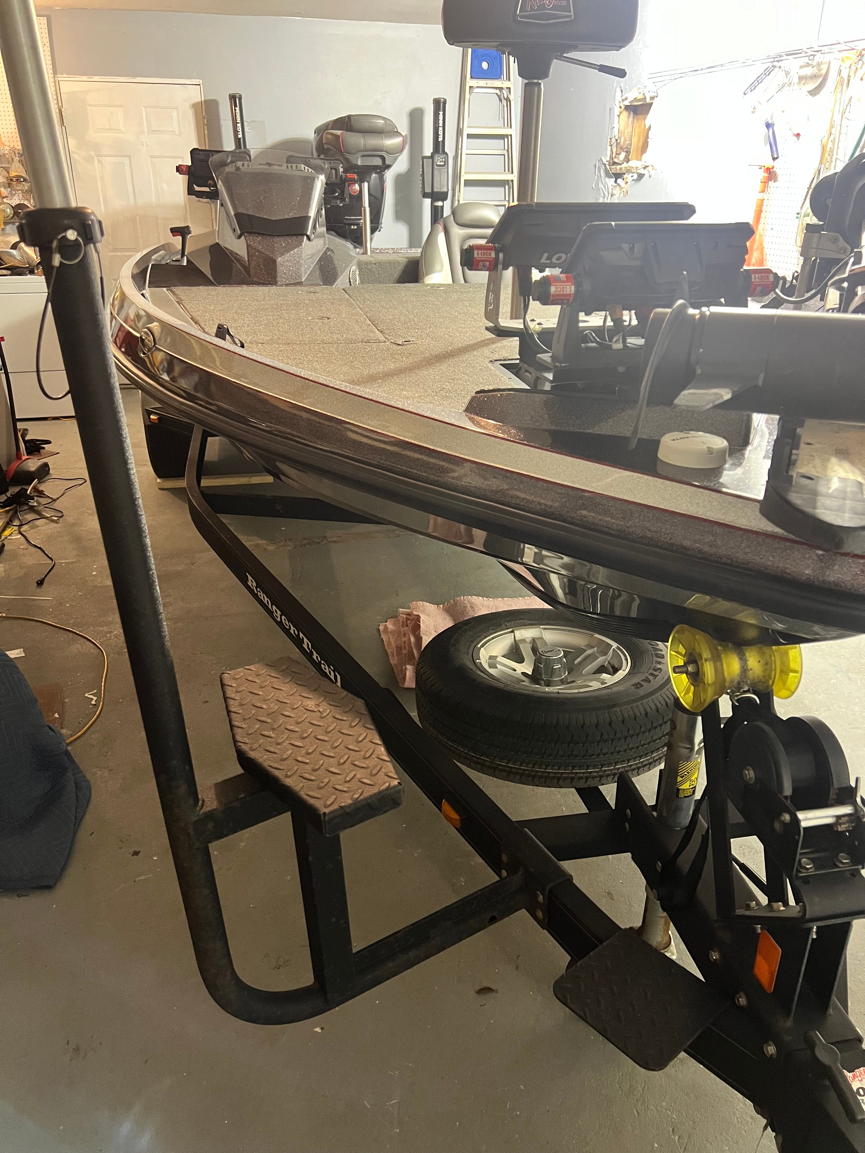 2022 Ranger Z185 boat on trailer in garage.