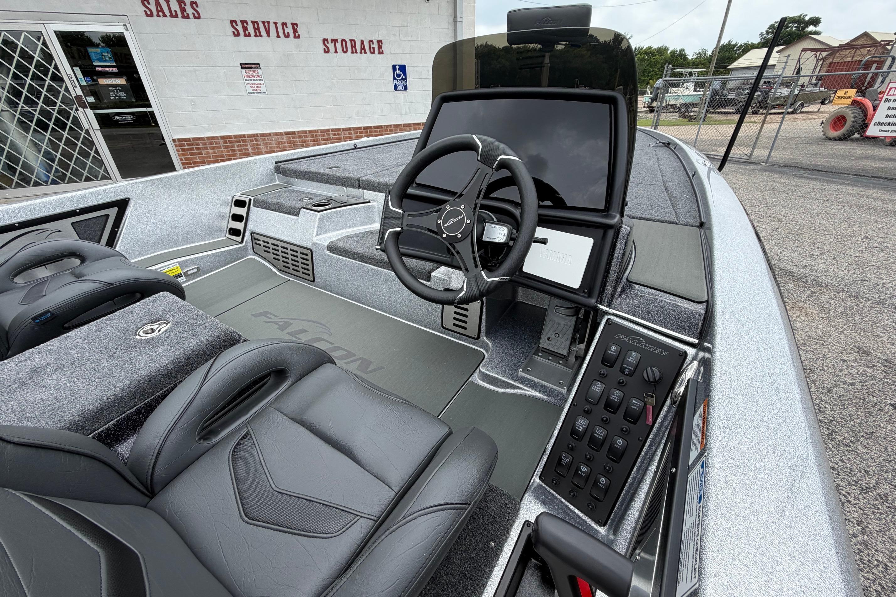 Interior of 2027 Falcon F20 PREDATOR boat with modern steering and controls.