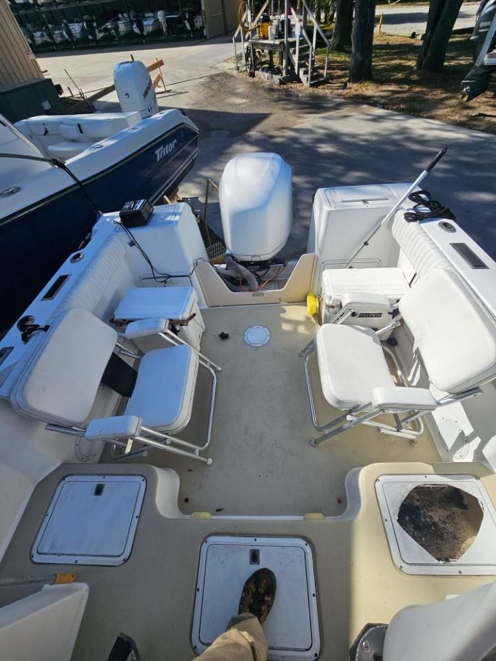 Interior view of a 1991 Pro-Line Cuddy Cabin boat with seating.