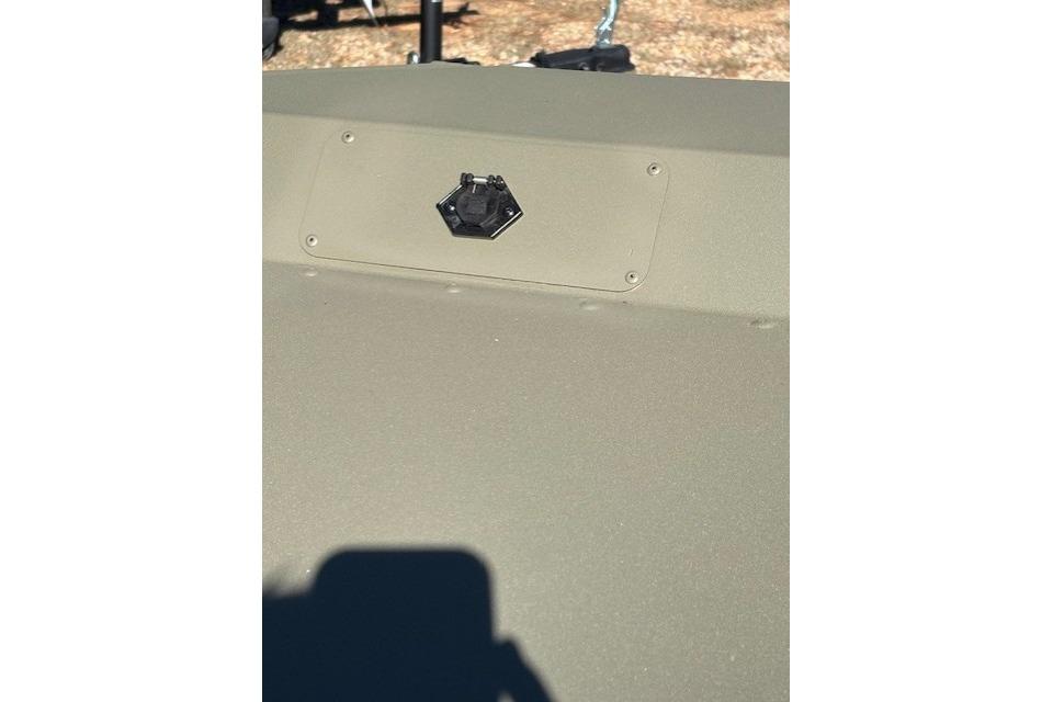 2026 Tracker Grizzly 1648 SC boat detail with a mounted accessory port.