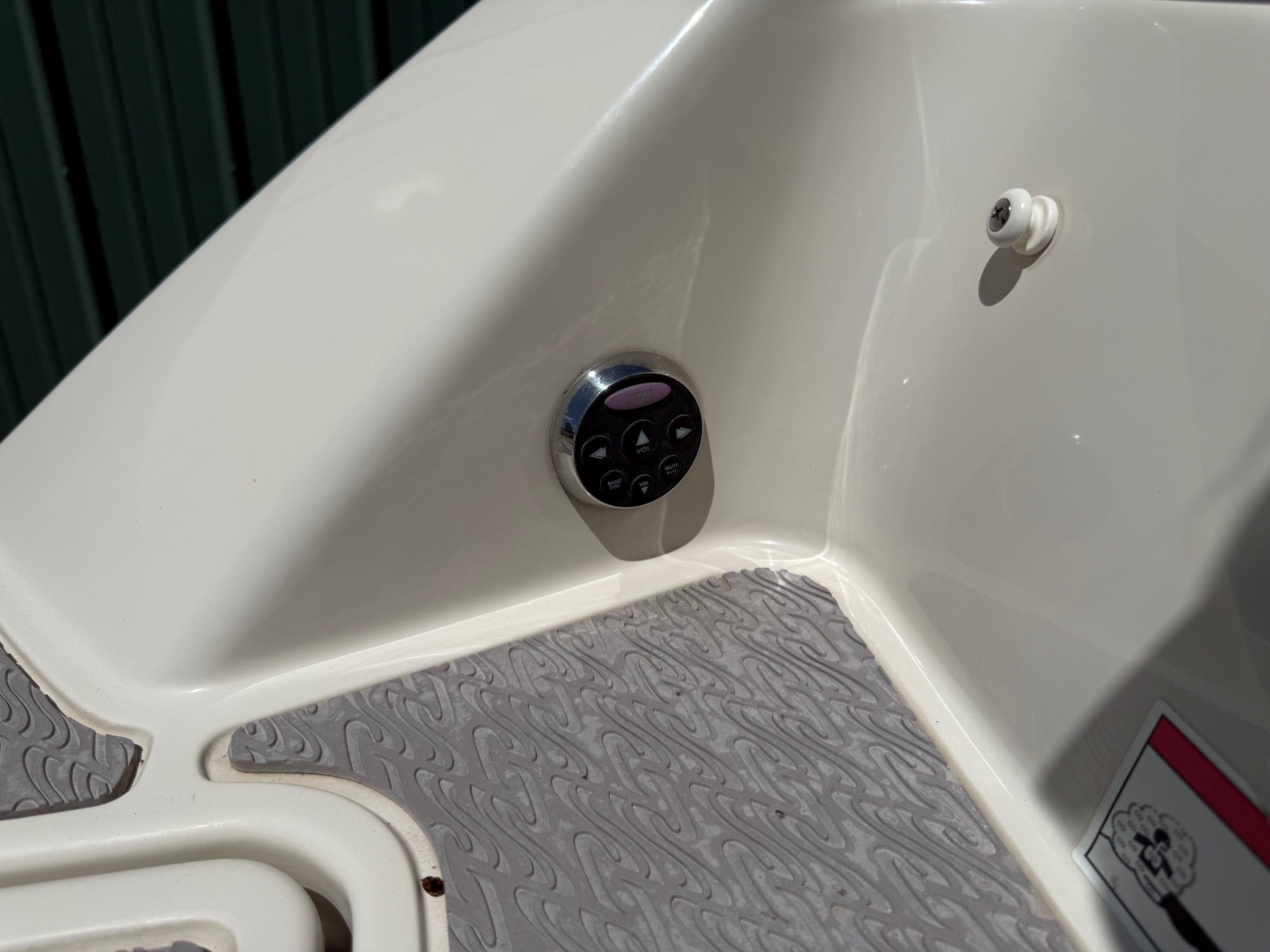 Close-up of a 2007 Sea Ray 230 Select boat.