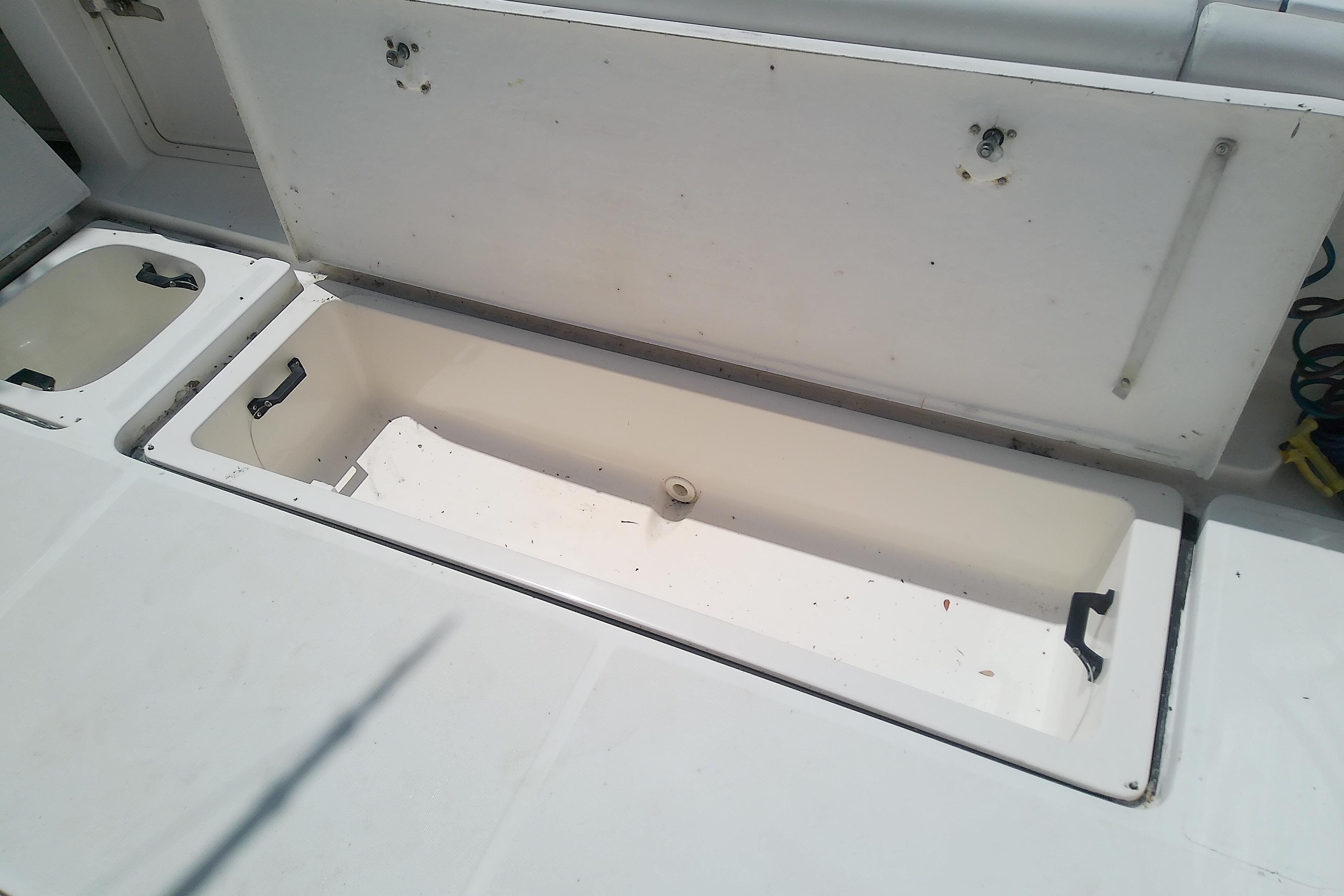 Open storage compartment on a 2000 Tiara Yachts 4100 Open boat deck.