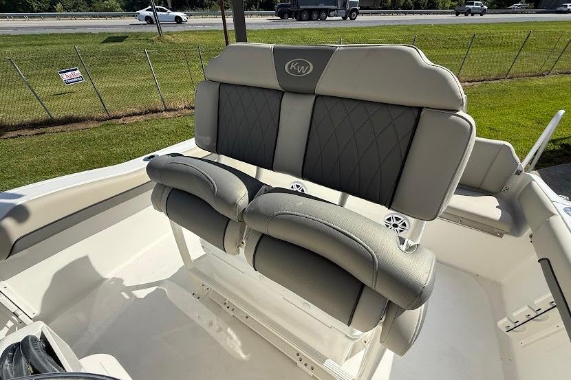 2026 Key West 219 FS boat seating with gray upholstery and diamond stitching.