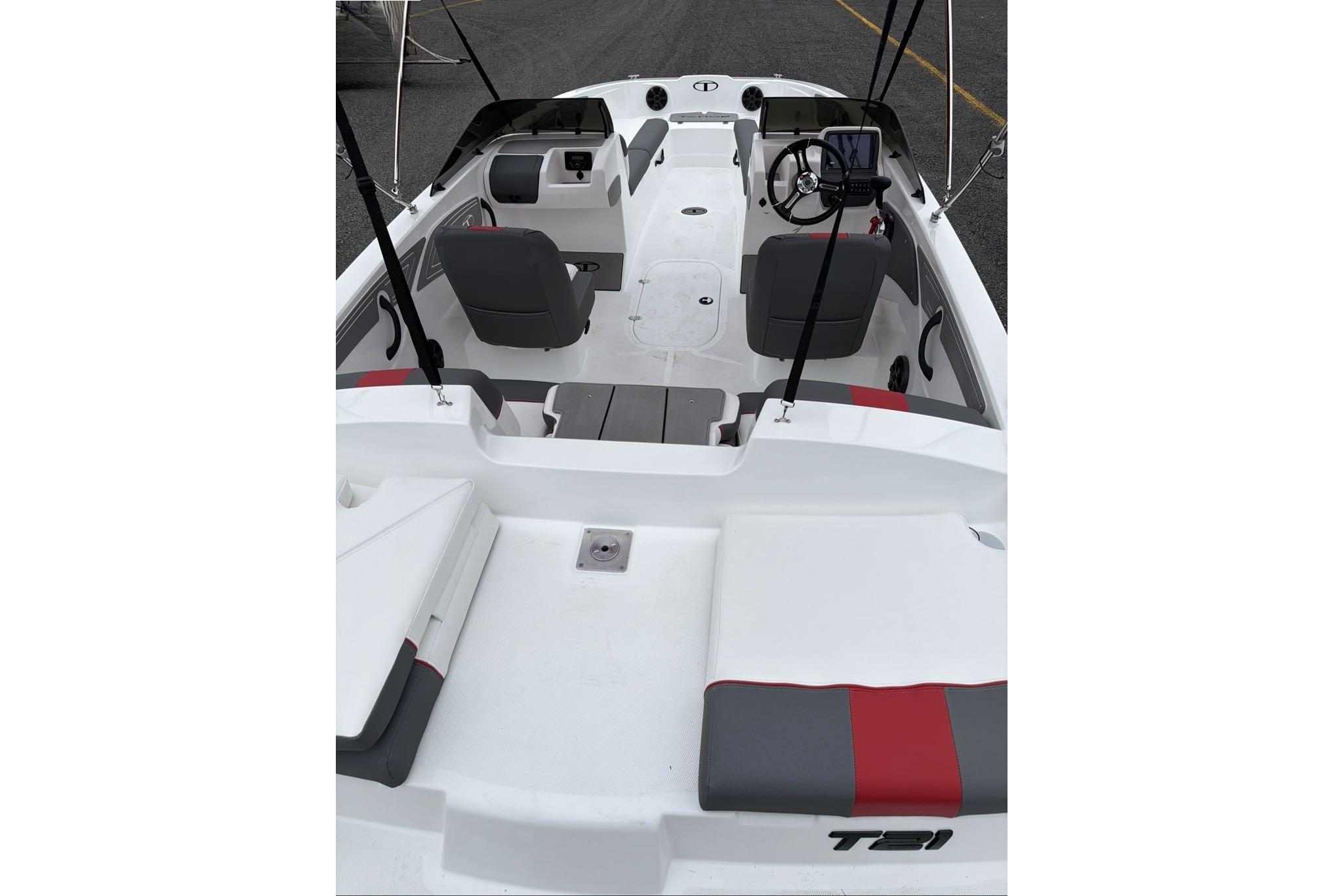 2026 Tahoe T21 boat interior with modern seating and steering console.