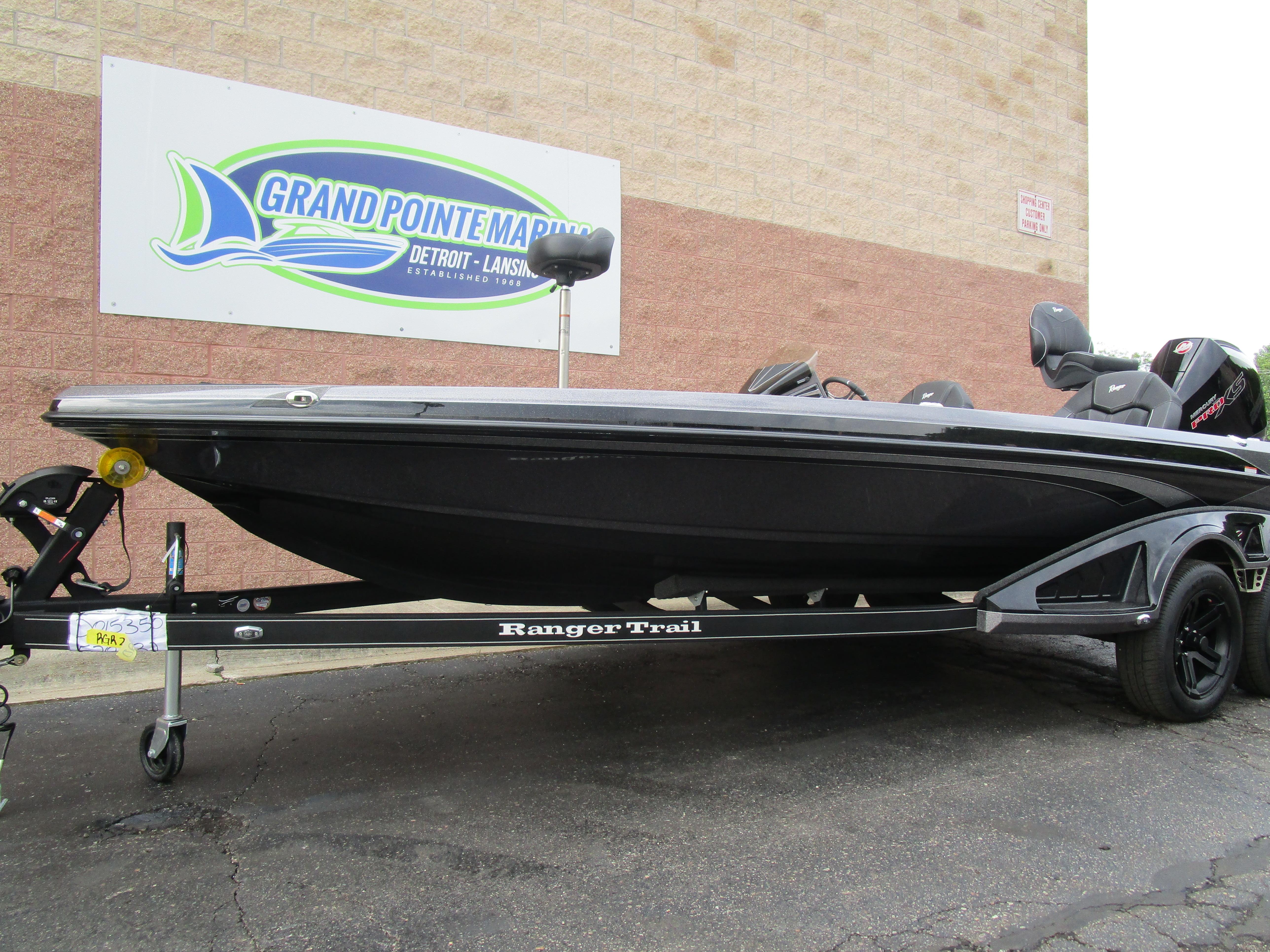 2025 Ranger Z520 boat on trailer at Grand Pointe Marina.