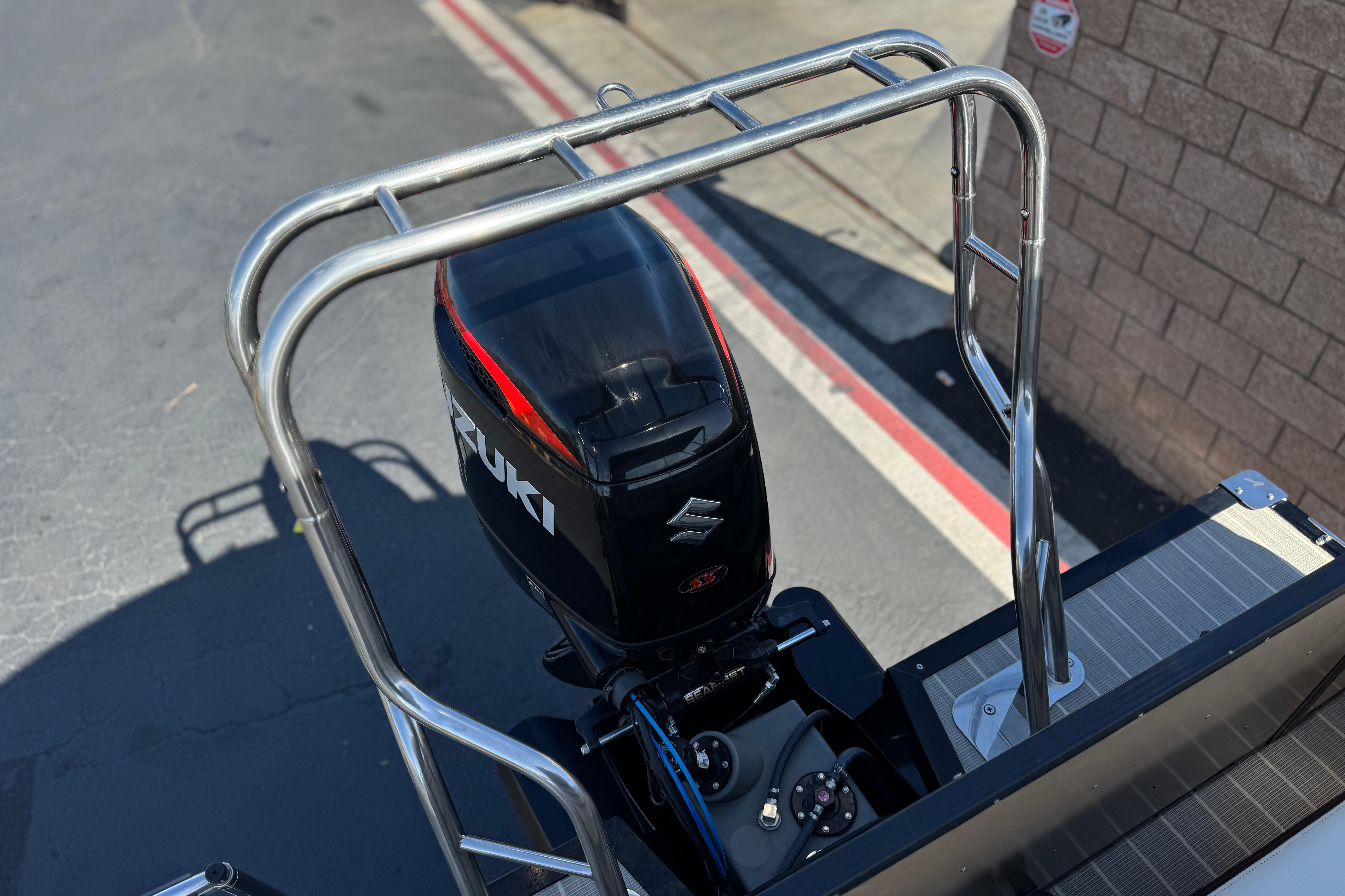 2023 Lexington 623 ST Xtreme boat with Suzuki outboard motor, viewed from above.