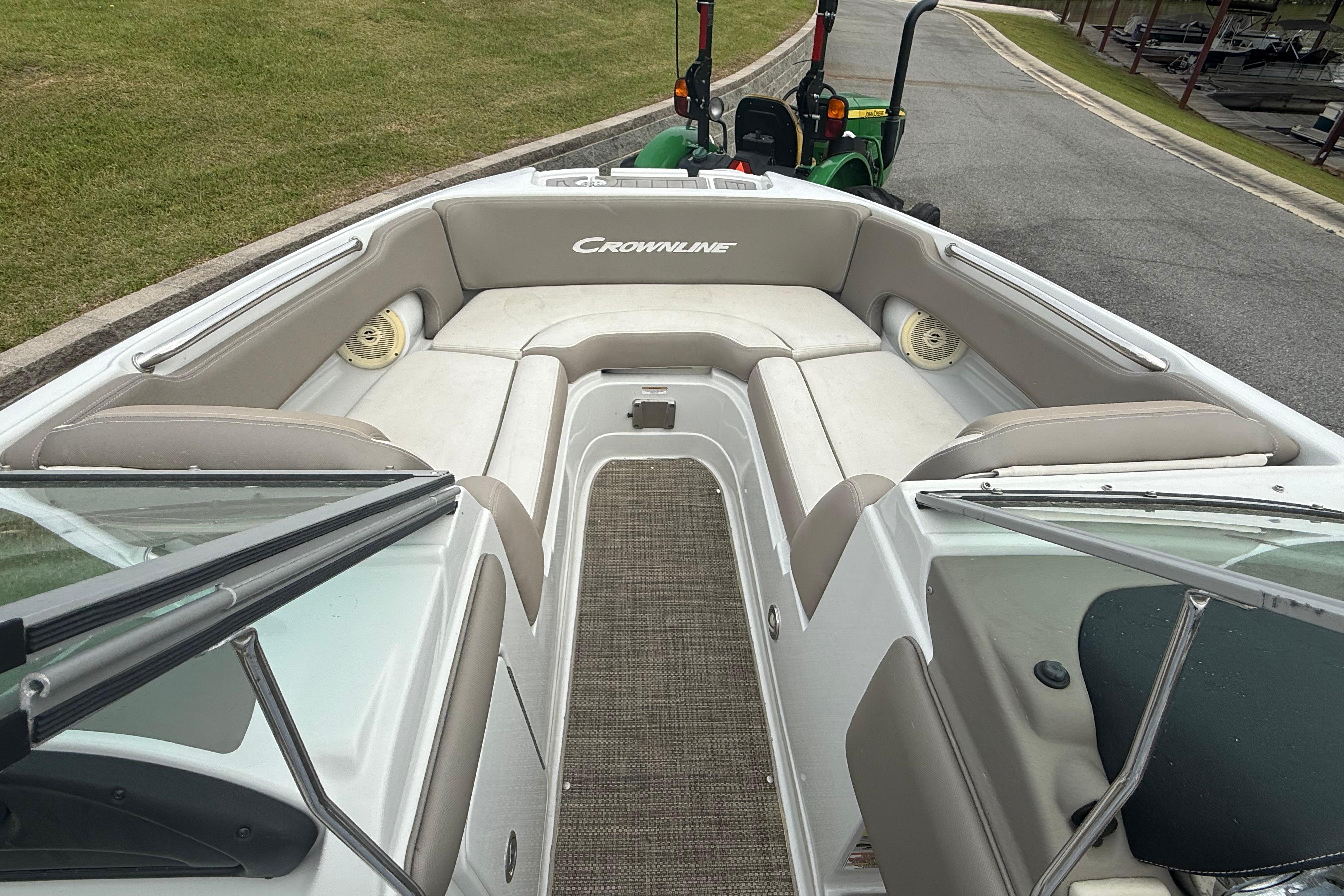 2017 Crownline Eclipse E1 XS boat interior with cushioned seating and carpeted floor.