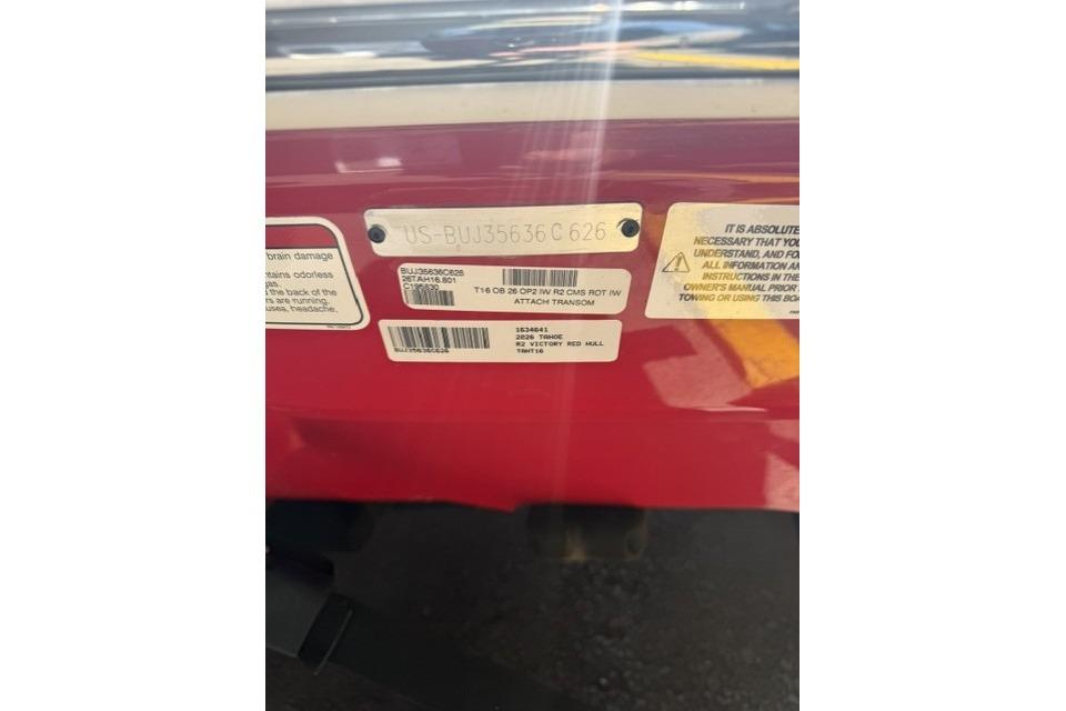 2026 Tahoe T16 identification labels on a red surface.