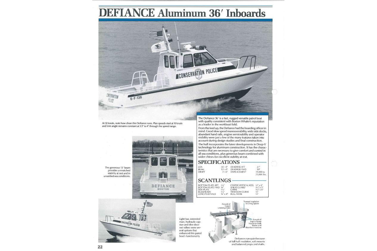 Boston Whaler 36 Defiance patrol boat, 1990 model, on water with specifications and features.