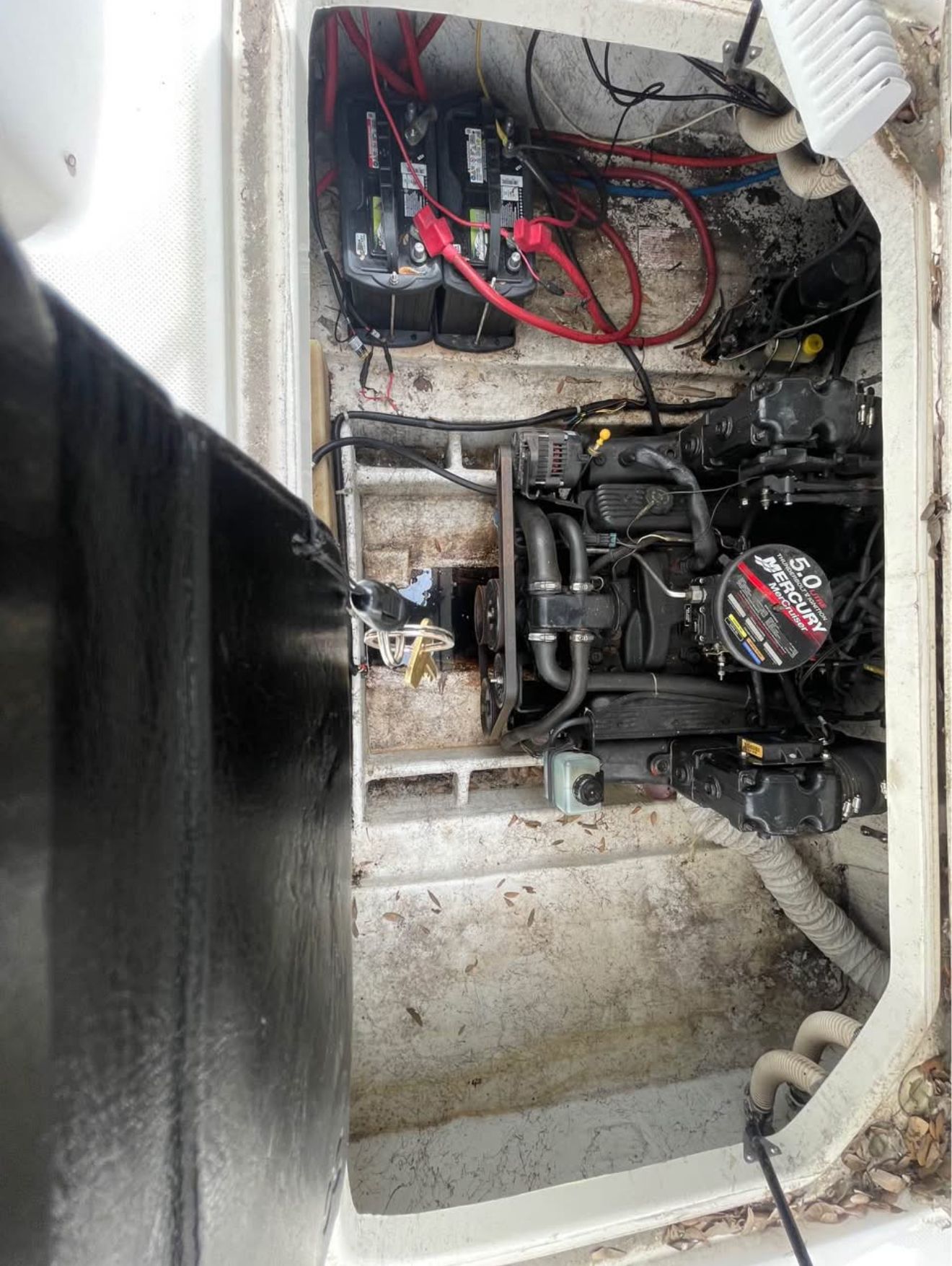 Engine compartment of a 2003 Bayliner 2452 Classic Cruiser.
