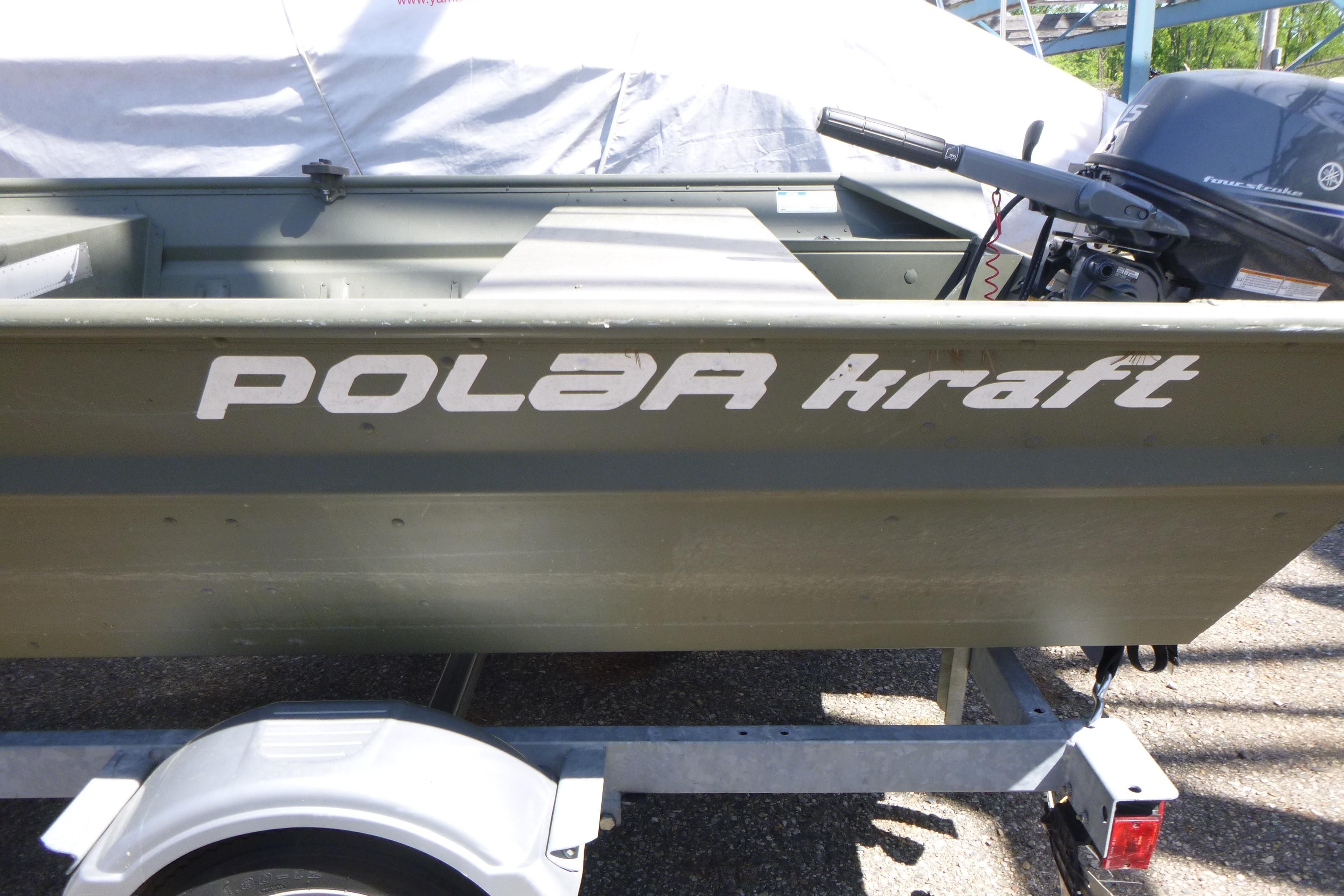 2014 Polar Kraft Jon MV 1448 LW boat on trailer, featuring outboard motor.