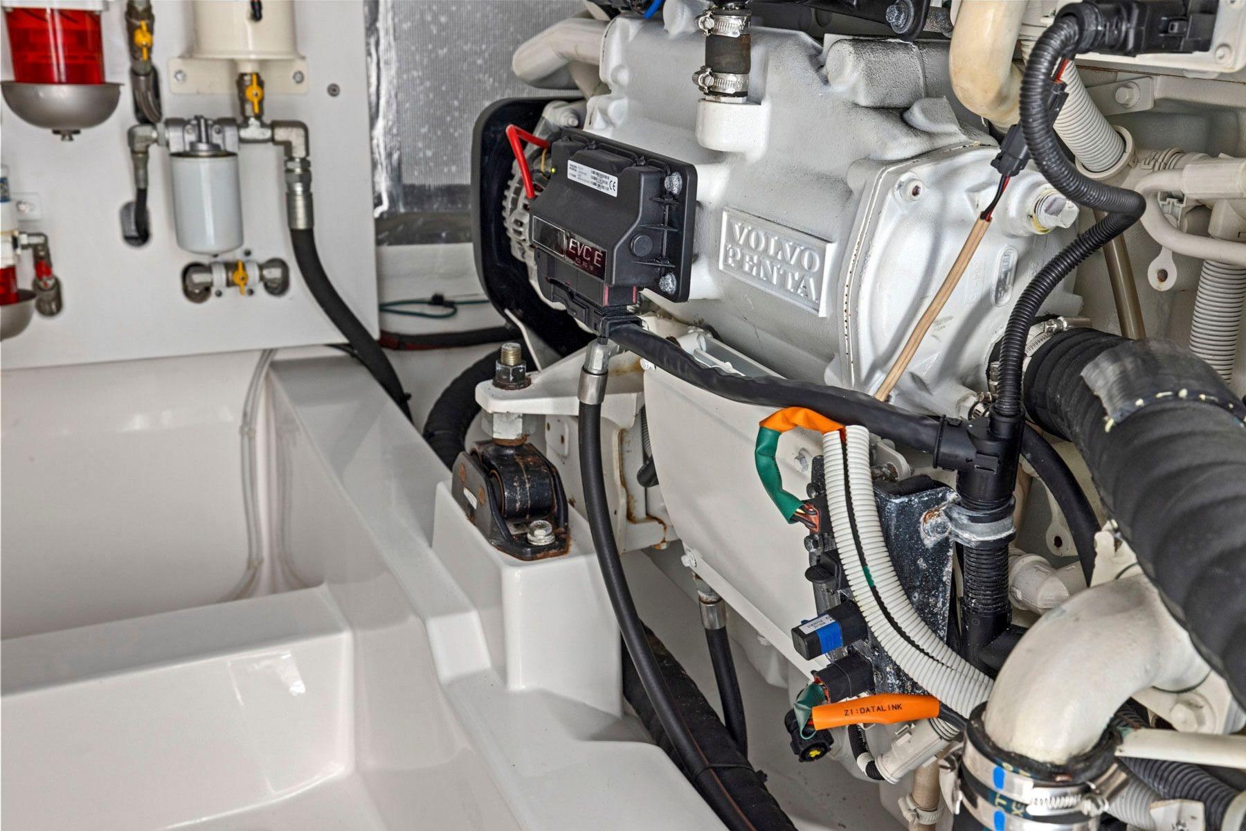 Engine room of 2014 Maritimo M50 yacht featuring Volvo Penta components.