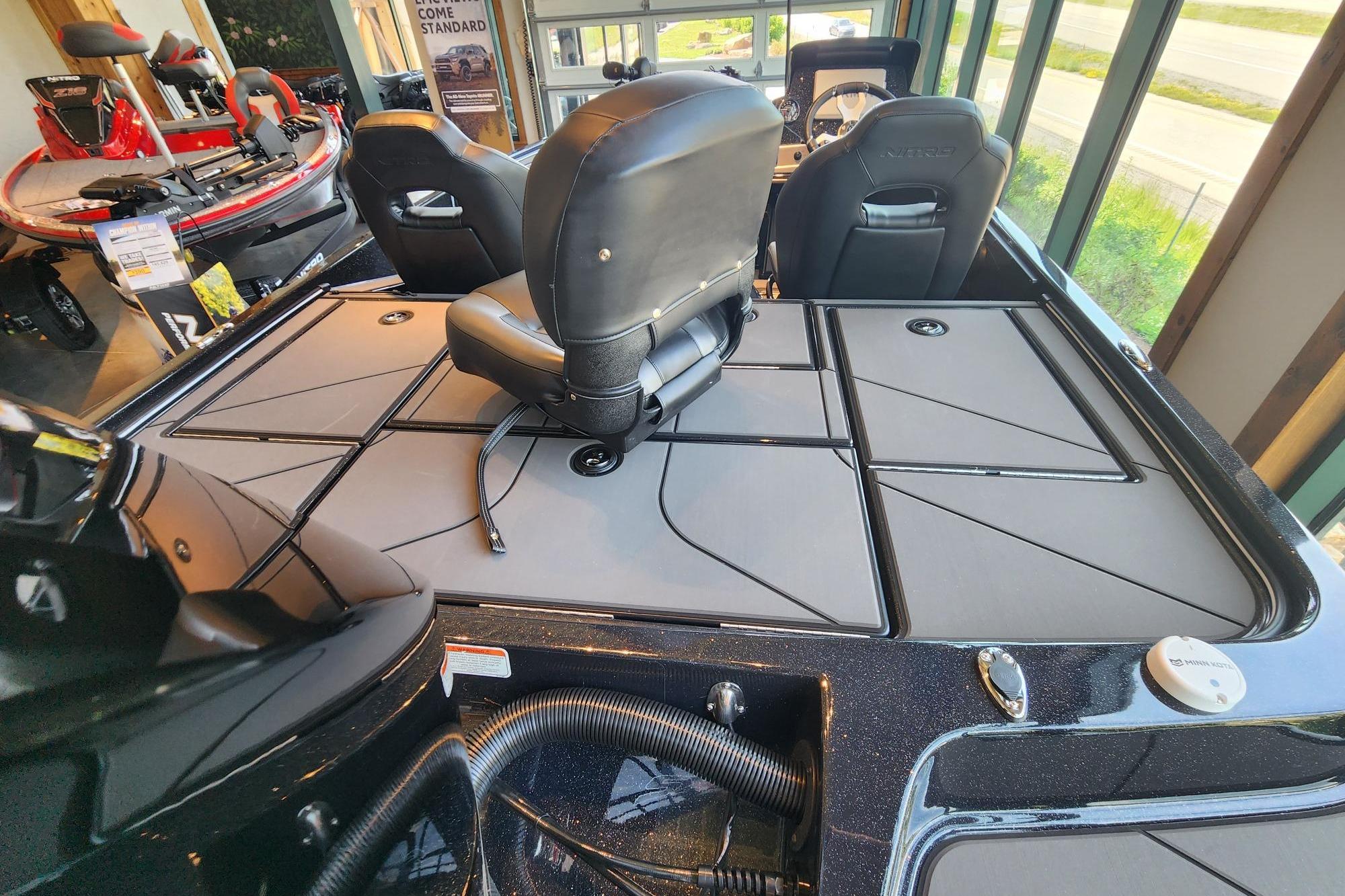 2026 Nitro Z19 XL Pro boat interior with sleek seating and storage compartments.