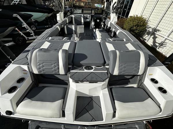 2025 Malibu Wakesetter 26 LSV boat interior with gray and white seating.