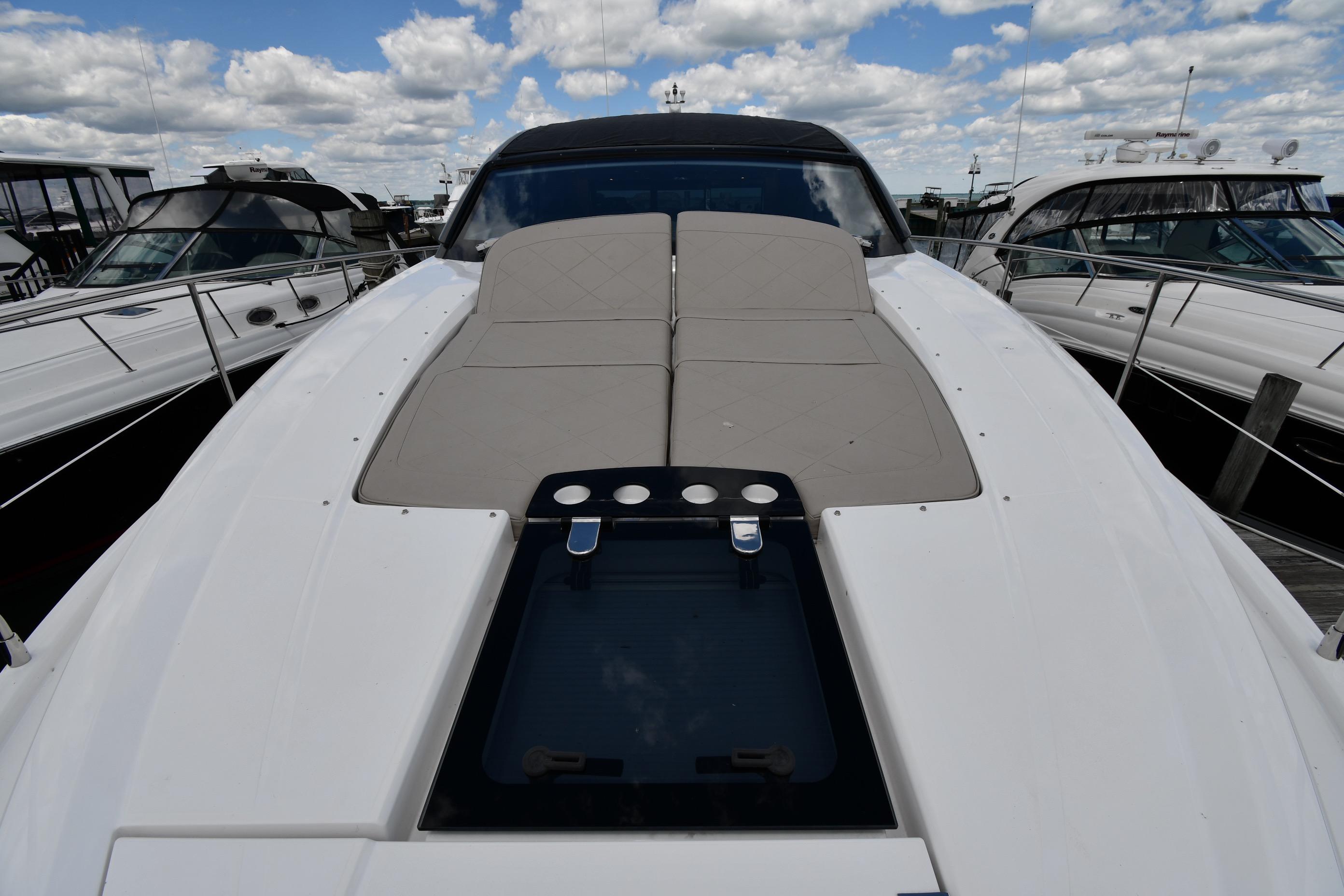 2024 Fairline G50 Targa yacht with sleek deck design under a cloudy sky.