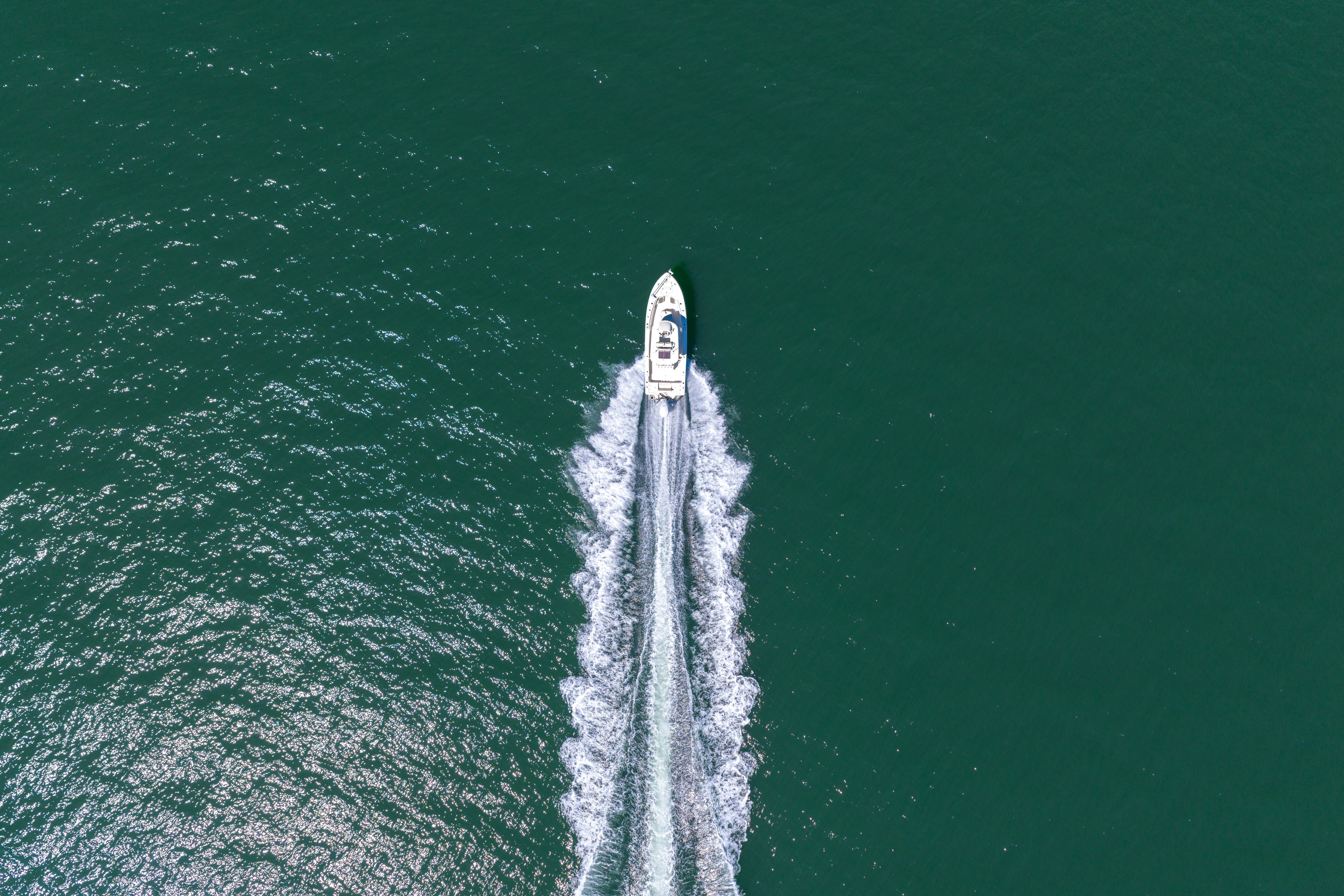 Aerial view of a Sportsman Masters 267OE Bay Boat on the ocean.