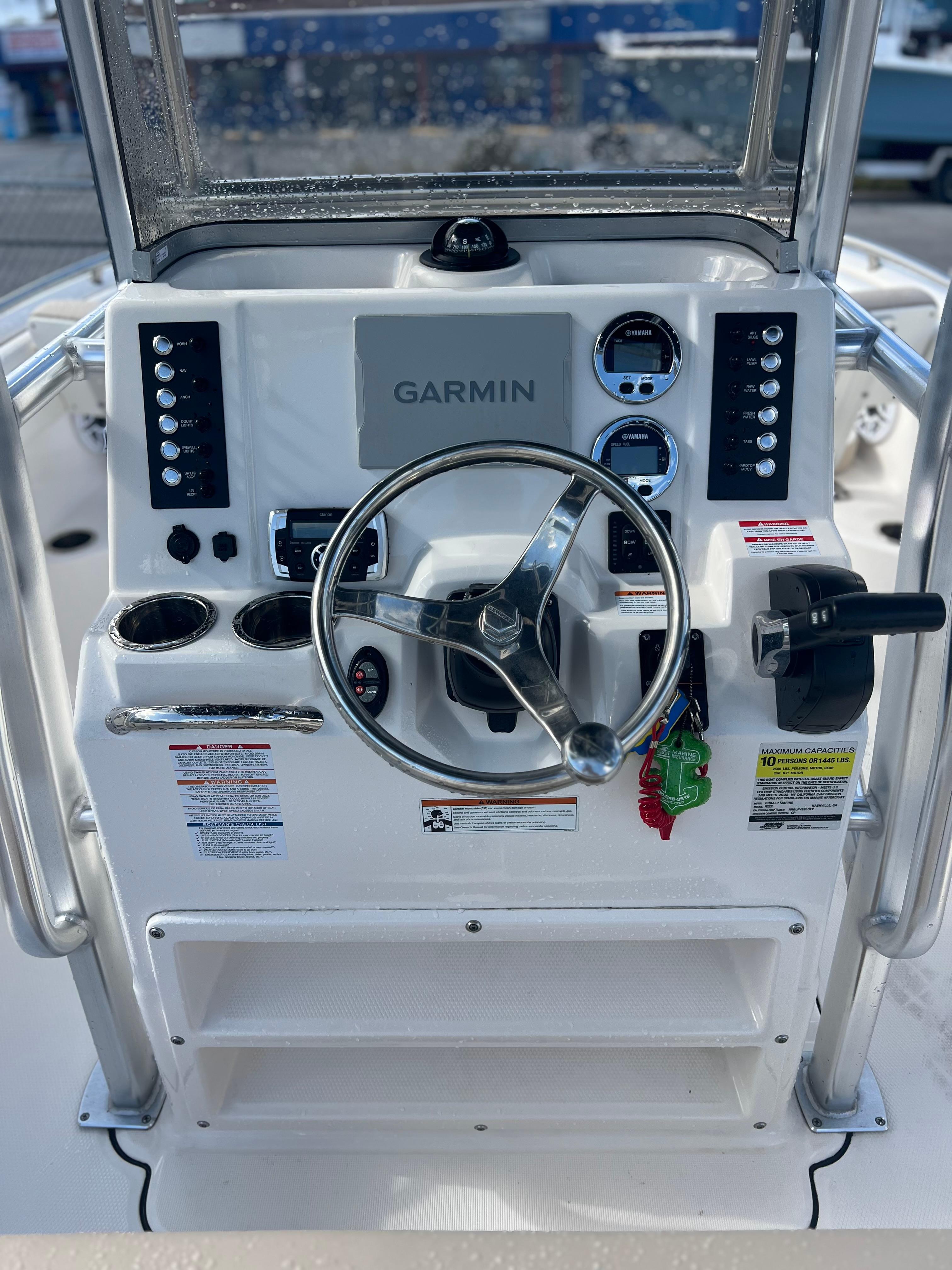 2022 Robalo R222 Center Console dashboard with Garmin navigation system and steering wheel.