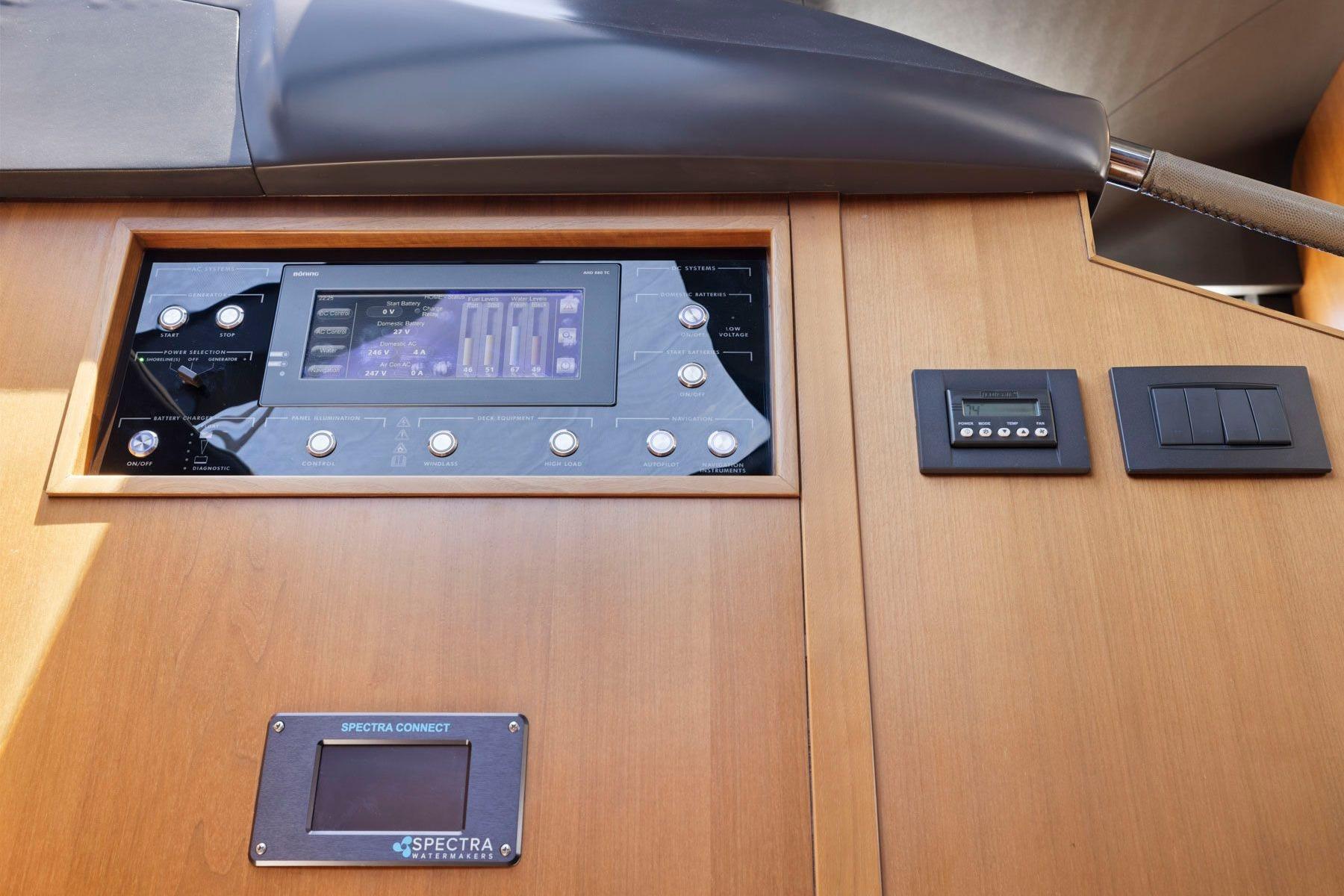 Control panel of a 2015 Princess 60 Flybridge Motor Yacht with Spectra Watermakers system.