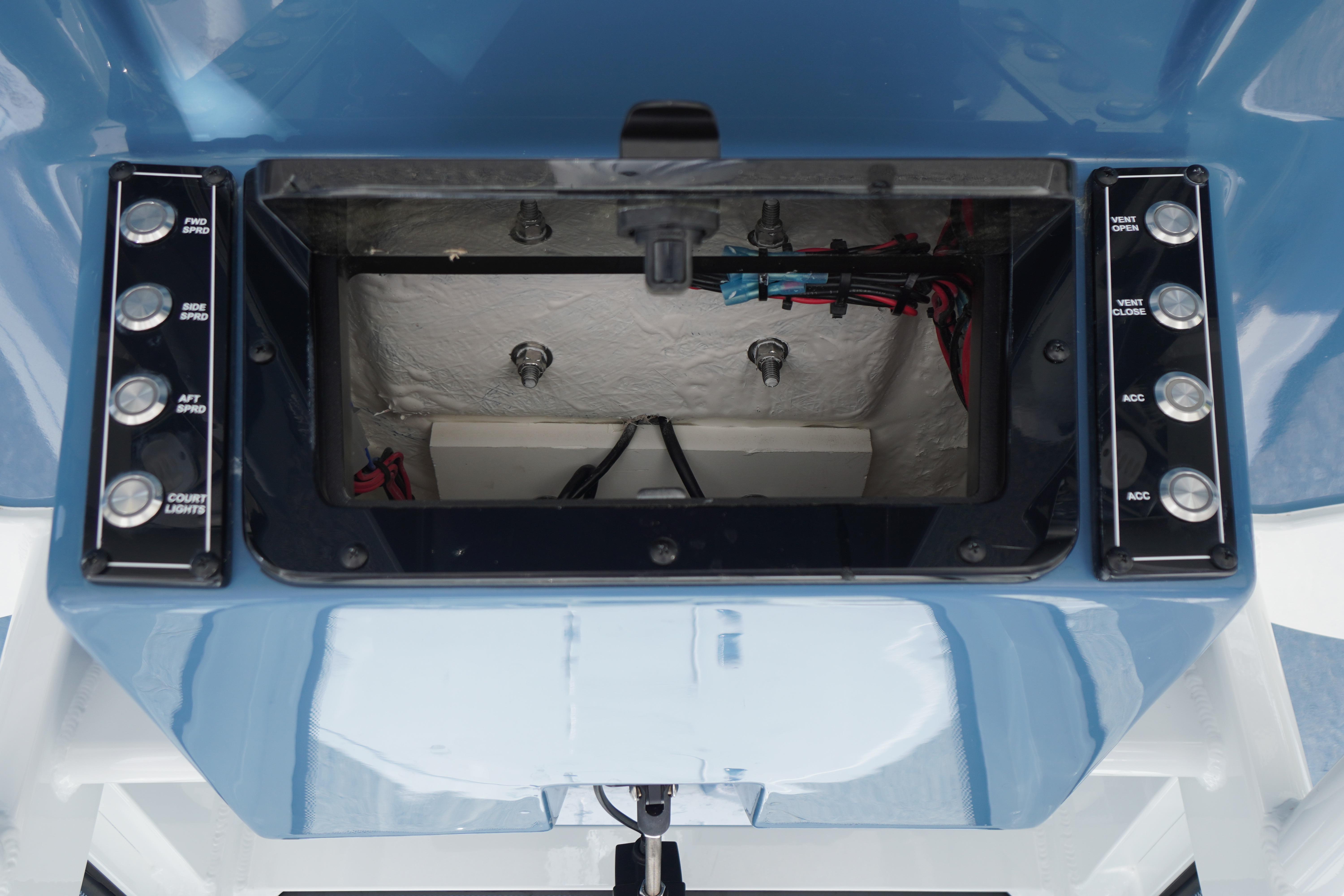 Control panel and compartment of 2025 Tidewater 232 SS boat.