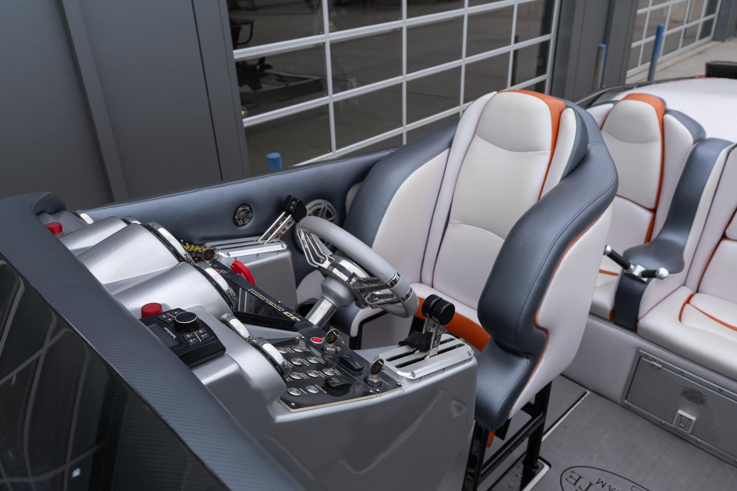 Cockpit of 2006 Cigarette 39' Top Gun Unlimited with modern controls and seating.