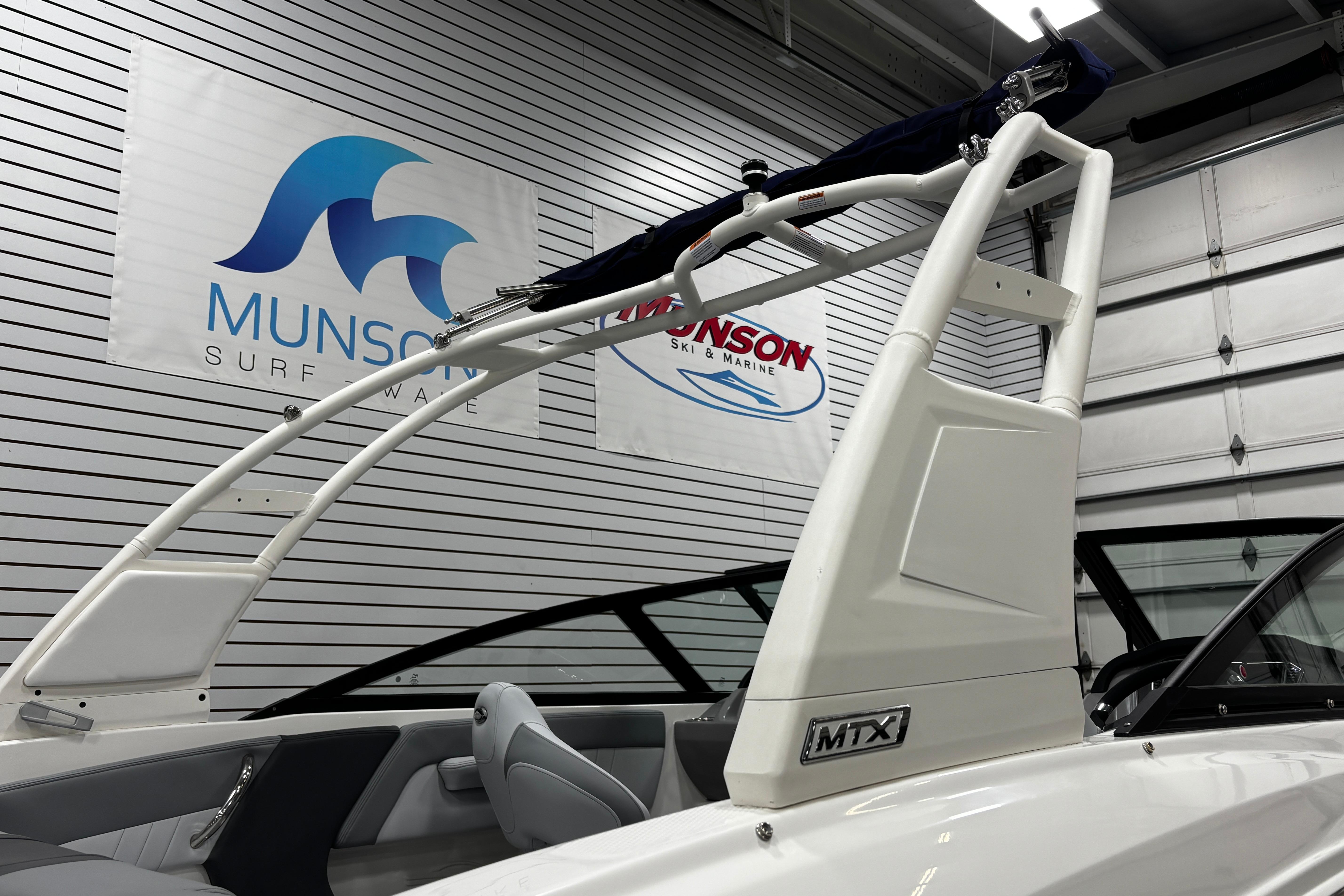 2026 Chaparral 21 SSi boat with MTX tower in showroom setting.
