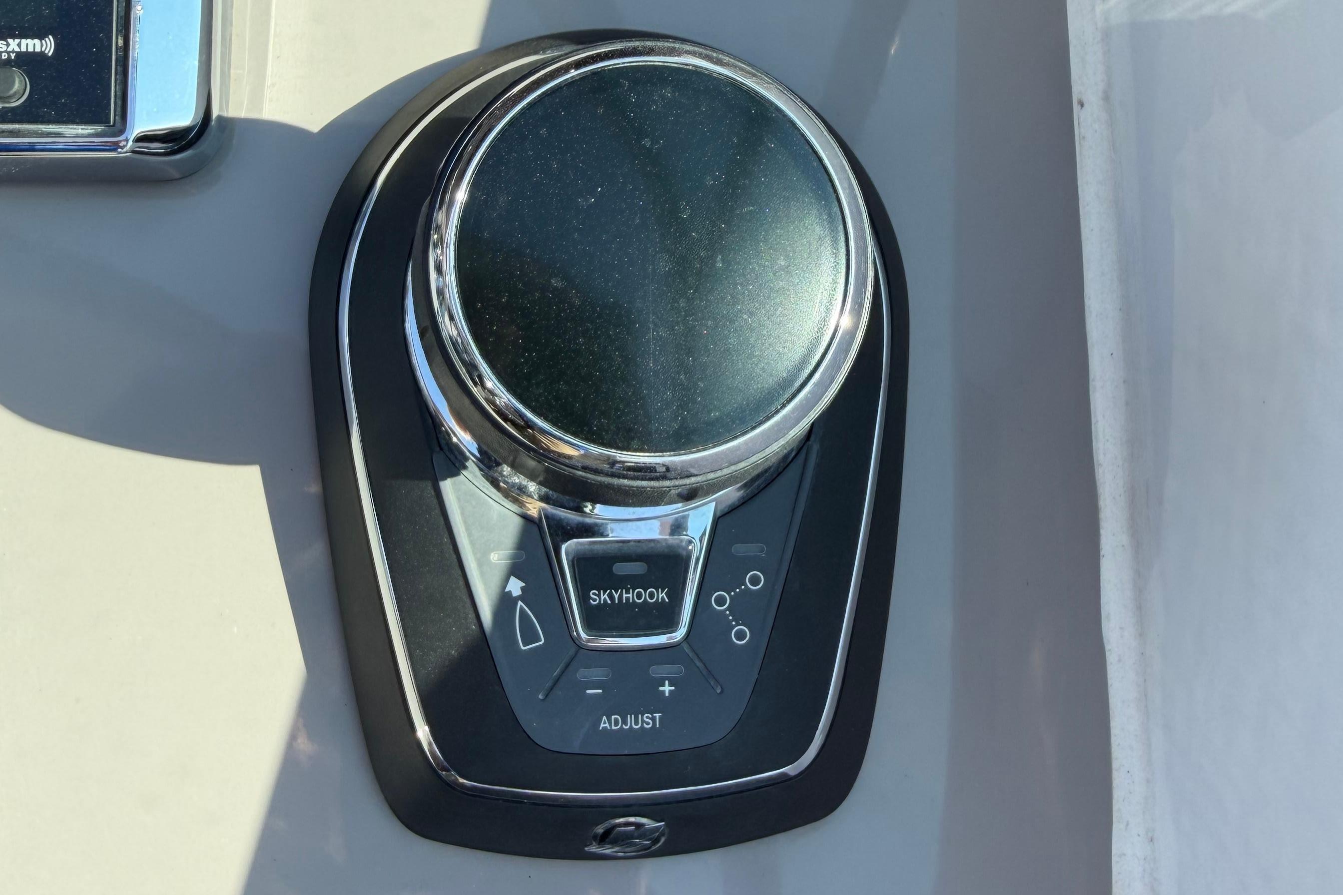 2019 Rinker EX 320 boat control panel with joystick and Raymarine system.