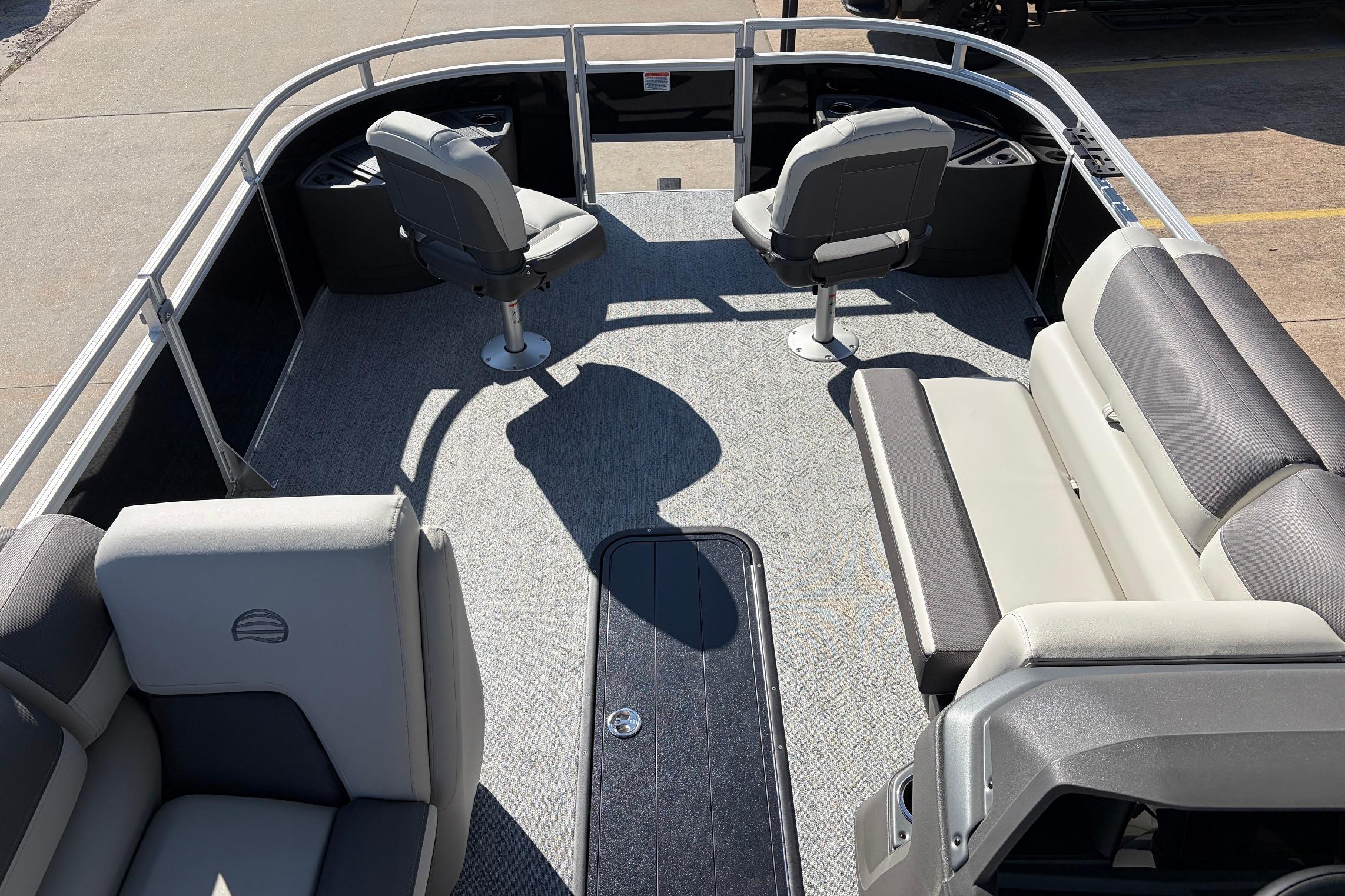2026 Sun Tracker Fishin' Barge 22 XP3 interior with seating and open deck space.