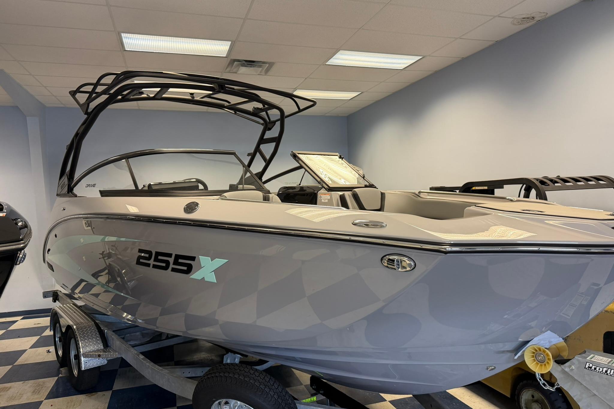 2026 Yamaha Boats 255XD in showroom, sleek design with modern features.