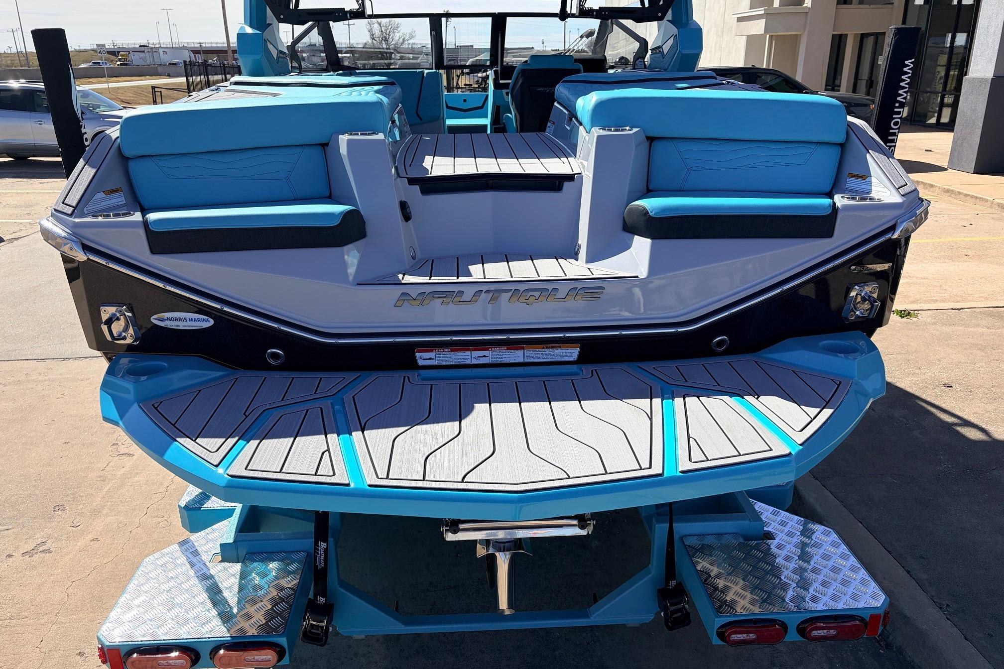 2026 Nautique Super Air Nautique G23 boat with blue seating and sleek design.