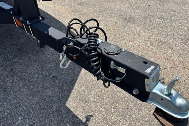 Trailer hitch of 2026 Tracker Grizzly 2072 CC on concrete surface.