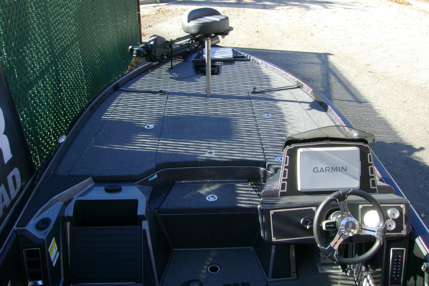 2025 Ranger Z520 boat interior with Garmin navigation system and steering wheel.